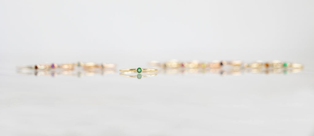 yellow gold emerald birthstone stacking ring