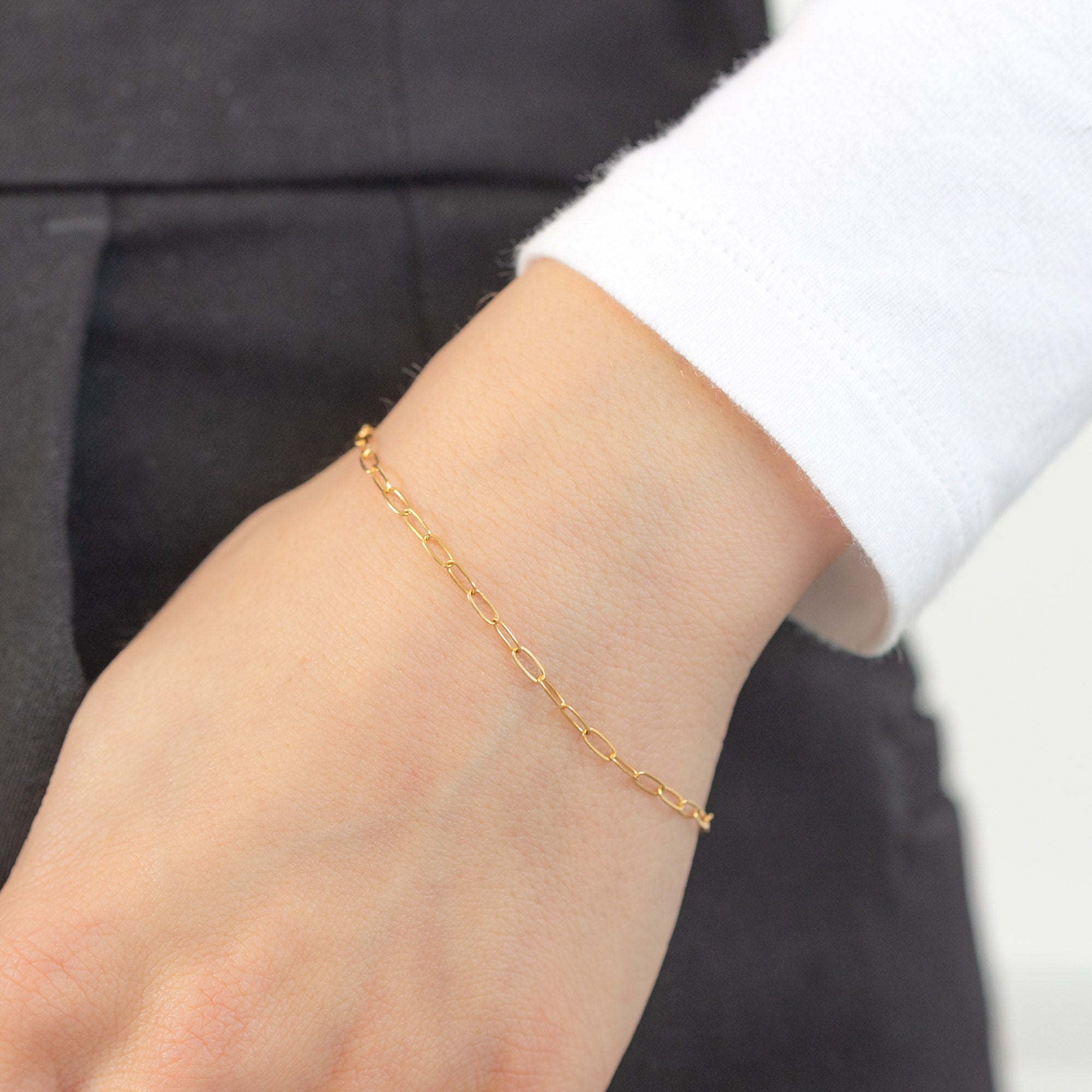 The Drawn Cable Chain Charm Bracelet in 10K Yellow Gold on Model