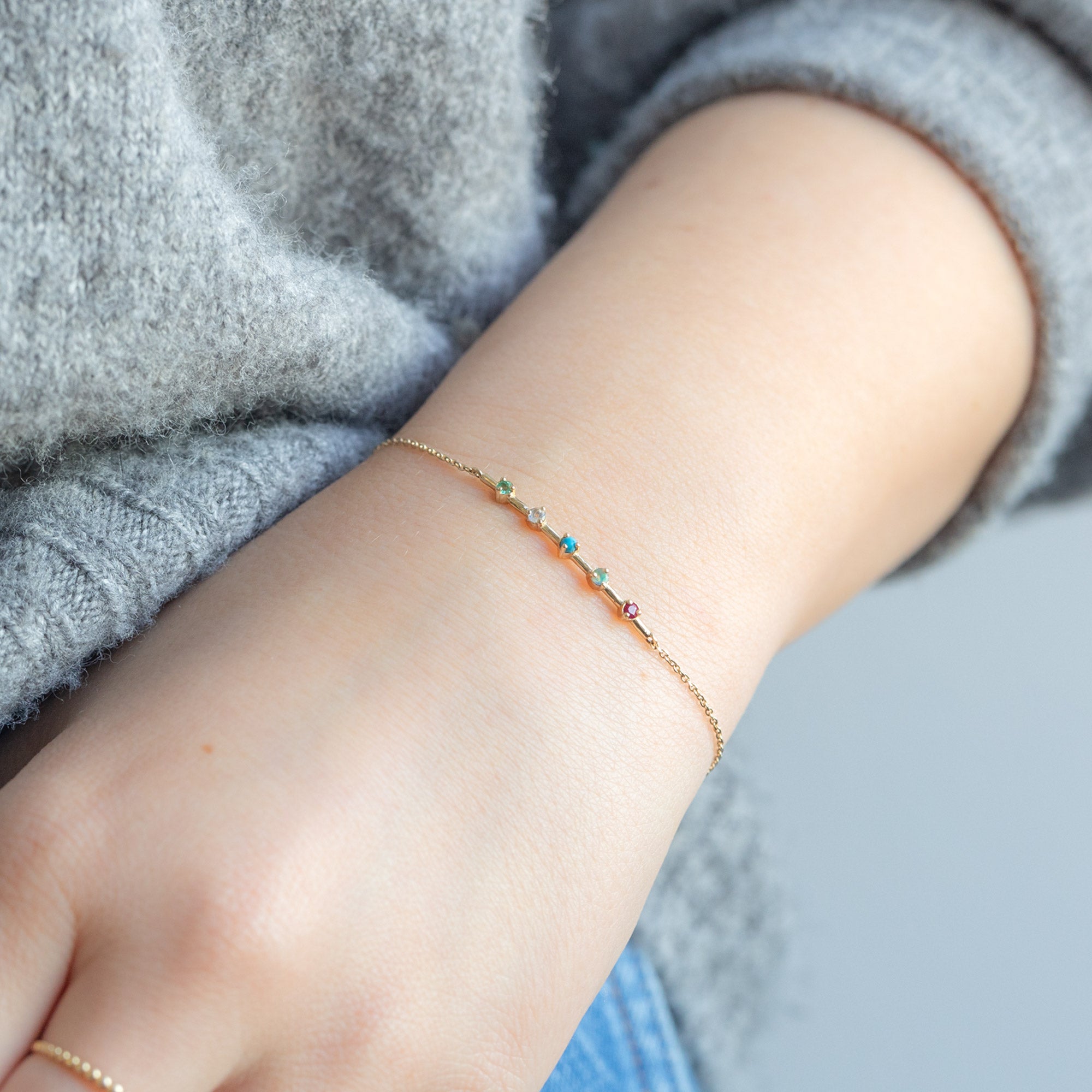 The Custom Multi-Birthstone Bracelet 5 Stone Option on Model