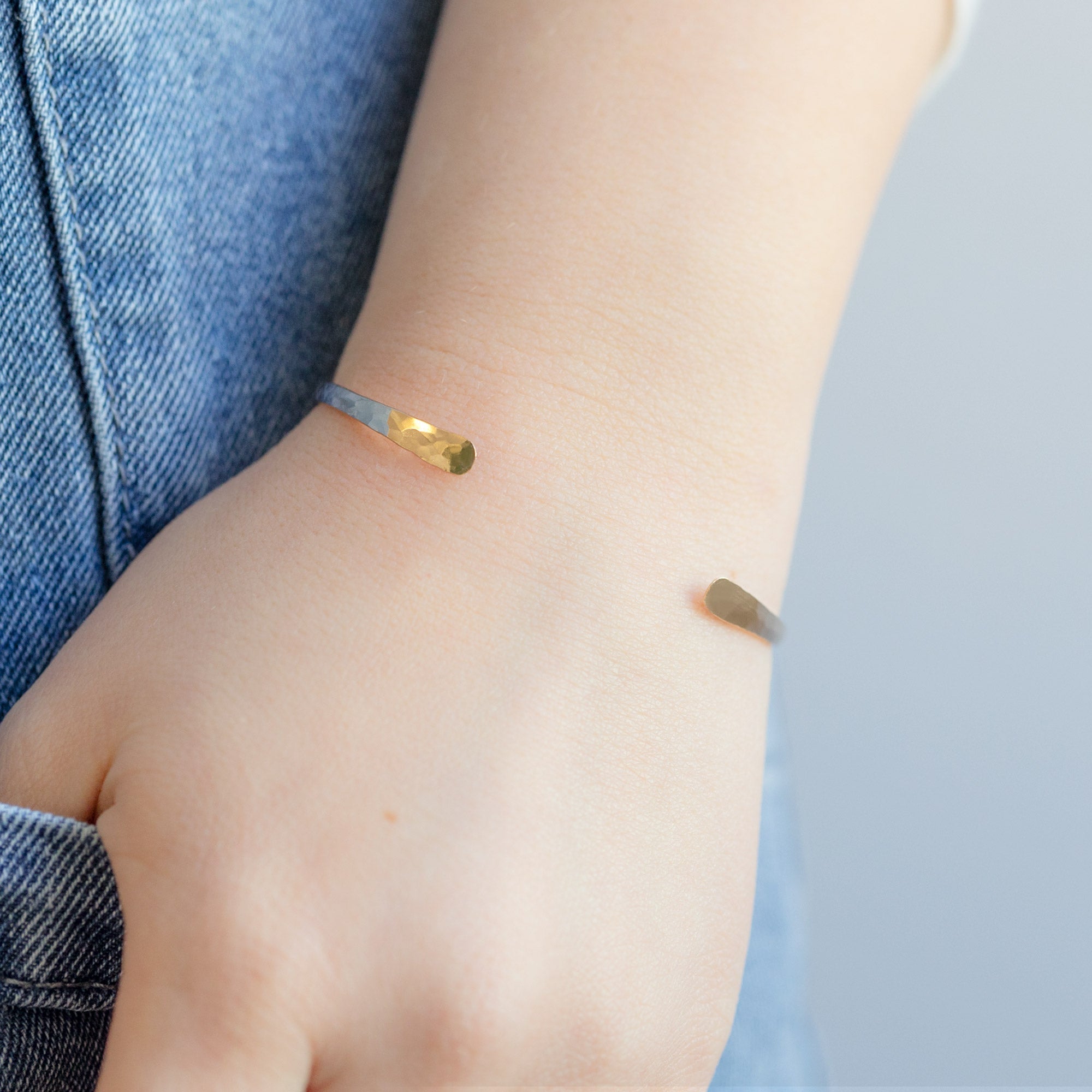 The Hammered Open Cuff Bracelet in Yellow Gold Filled on Model