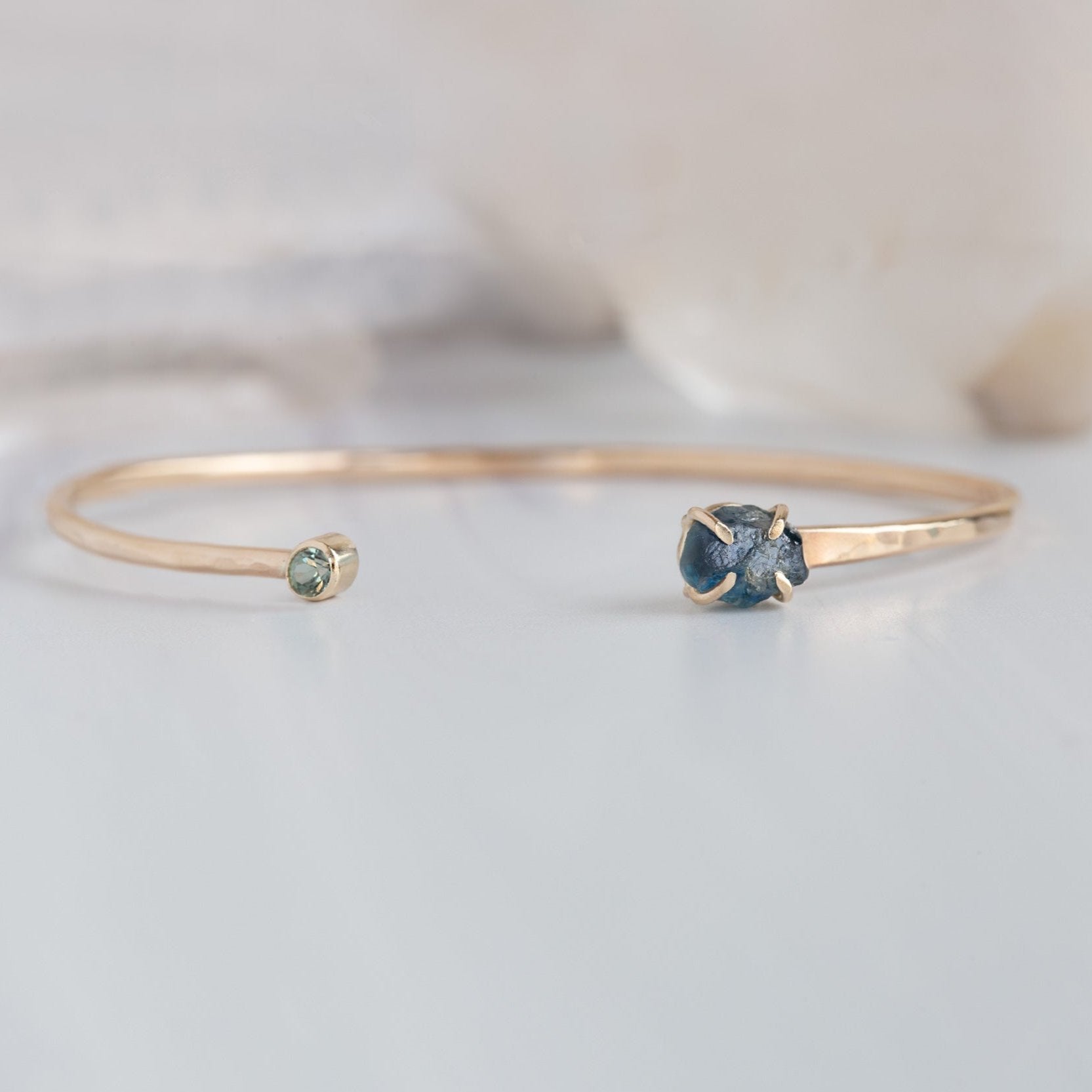 The Raw Montana Sapphire Cuff Bracelet in Yellow Gold Filled on White Mable
