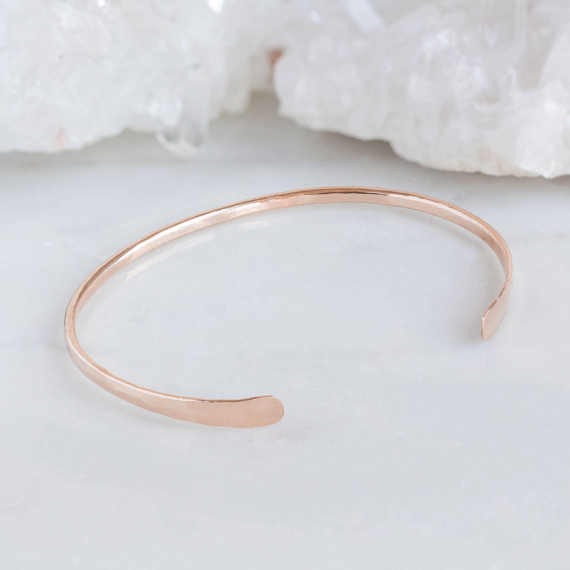 The Hammered Open Cuff Bracelet in Rose Gold Filled on White Marble