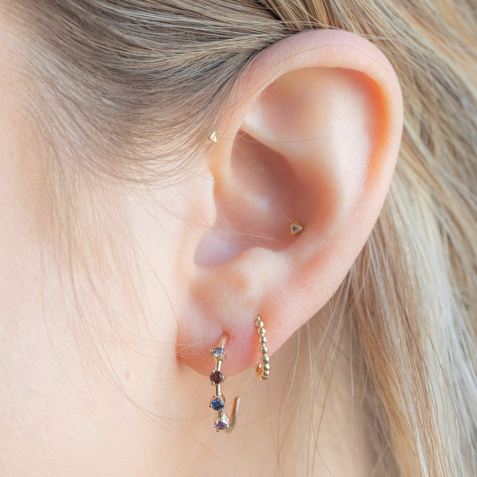 The Custom Multi-Birthstone Hoops 4 Stone Option Stacked on Model