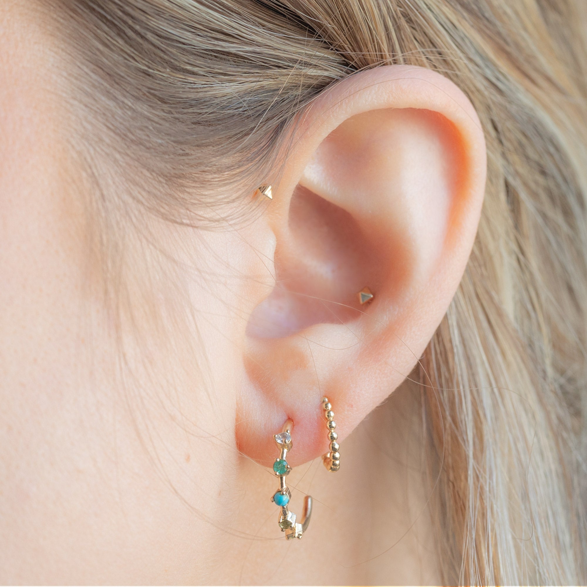 The Custom Multi-Birthstone Hoops 5 Stone Option Stacked on Model