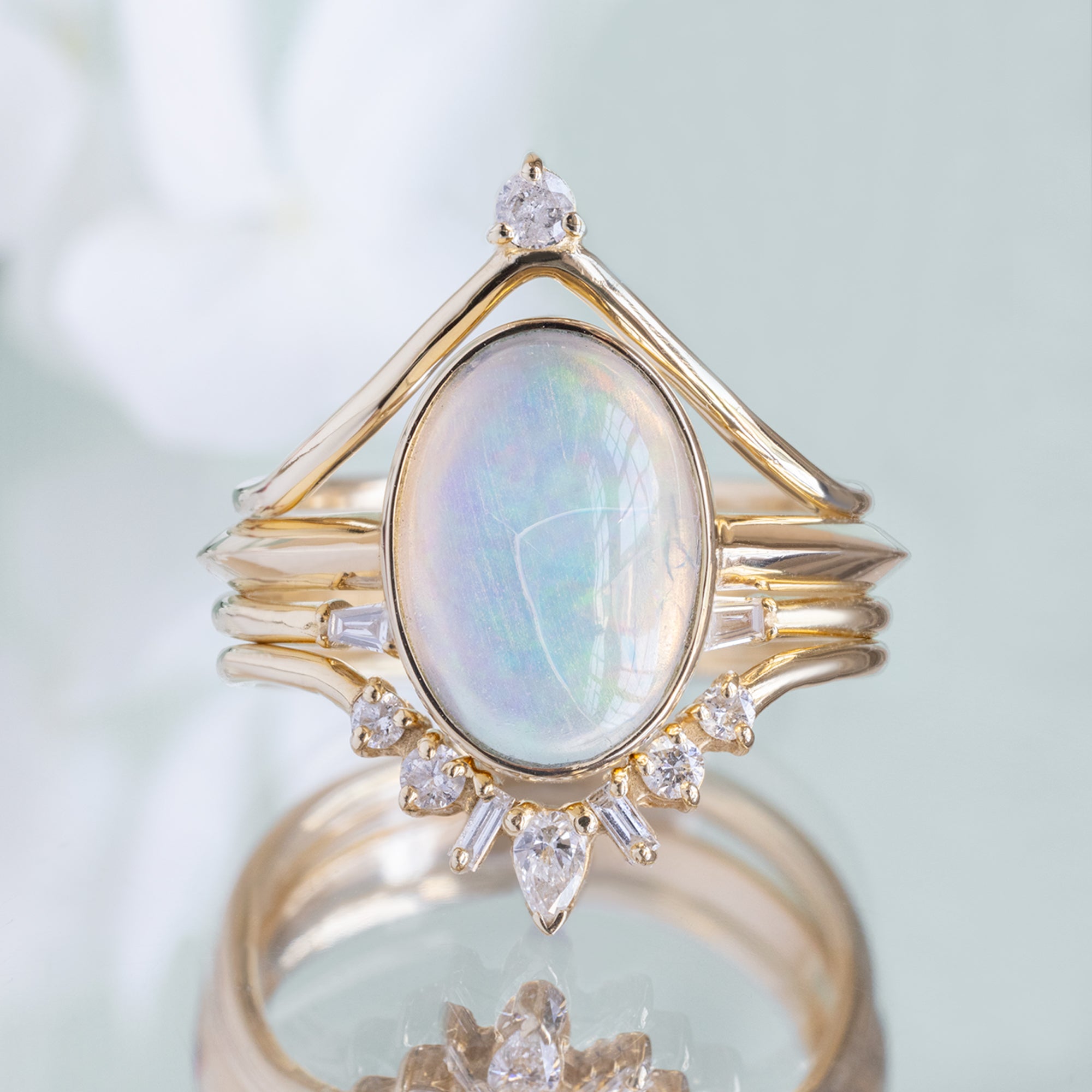 buy:white-diamond-crown-stacking-band-14k-or-18k-yellow-gold,the-hazel-ring-1-97ct-oval-opal-in-14k-yellow-gold,open-cuff-baguette-white-diamond-stacking-band-14k-or-18k-yellow-gold,geometric-white-diamond-sunburst-stacking-band-14k-or-18k-yellow-gold