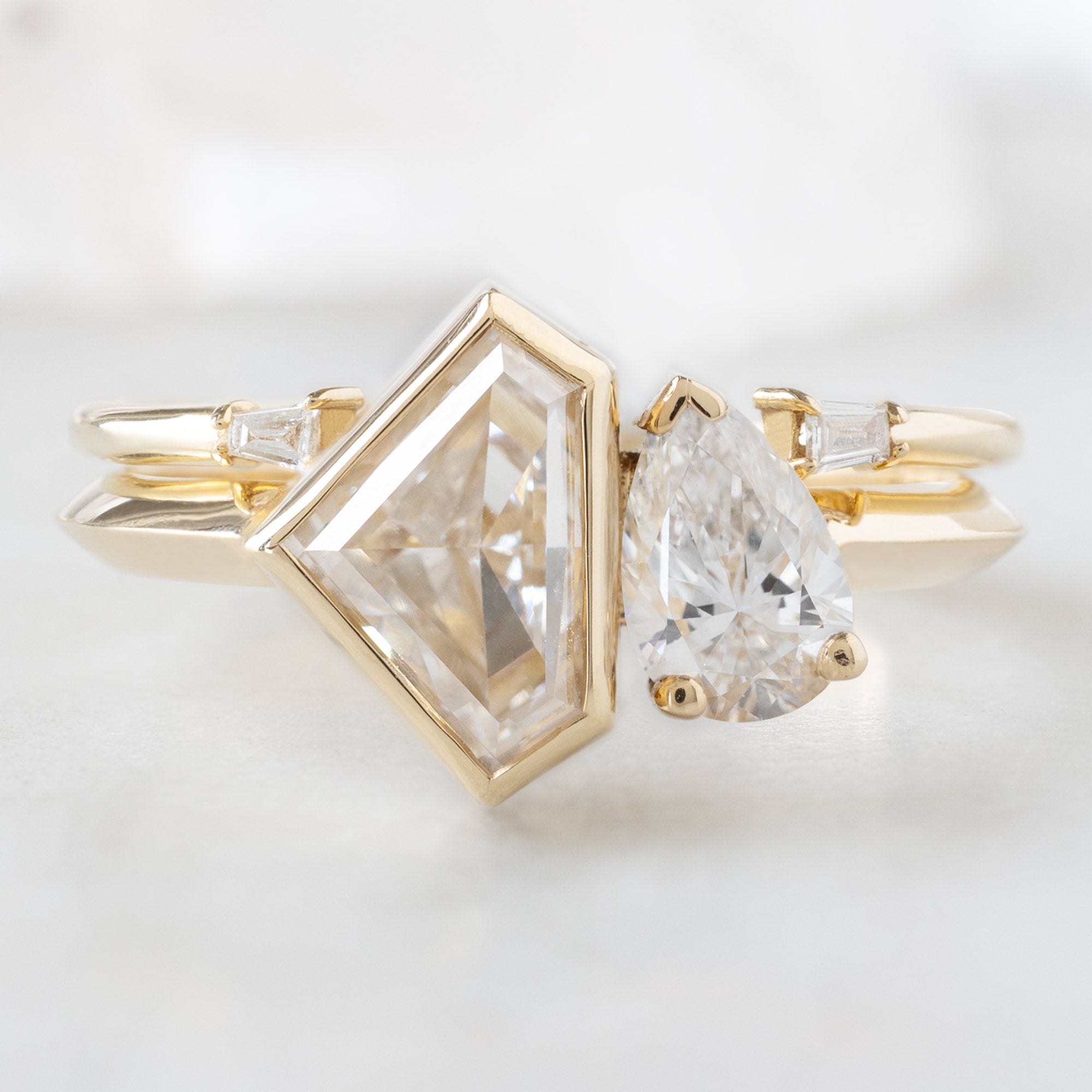 The You and Me Ring with a 1.36ct Lab Grown Shield White Diamond in 14K Yellow Gold Stacked with the Open Cuff Baguette Stacking Band