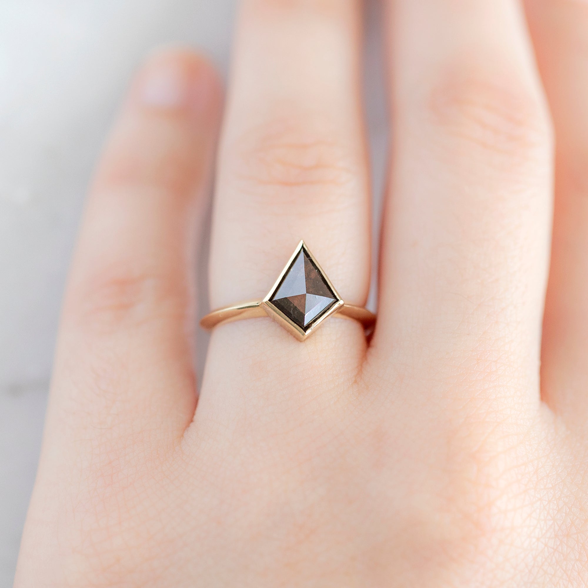 The Hazel Ring with a 1.31ct Kite Black Diamond in 14K Yellow Gold on Model