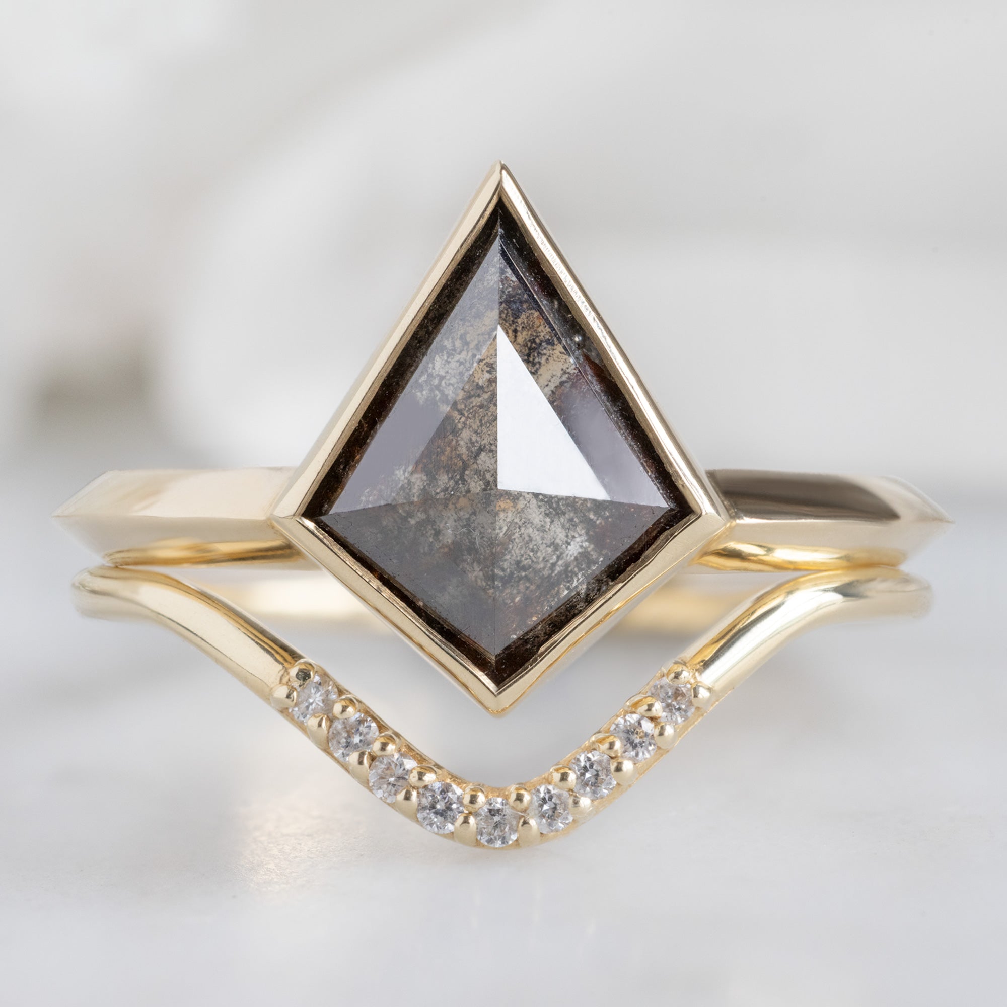 The Hazel Ring with a 1.31ct Kite Black Diamond in 14K Yellow Gold Stacked with the Pavé Peak Diamond Stacking Band