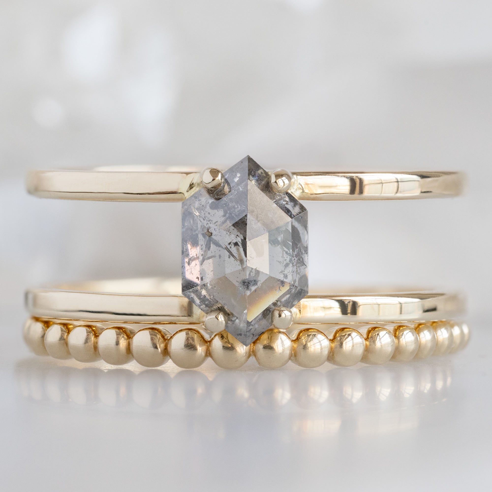 buy:the-poppy-ring-1-02ct-hexagon-salt-and-pepper-diamond-in-14k-yellow-gold,the-gold-beaded-stacking-ring-14k-yellow-gold