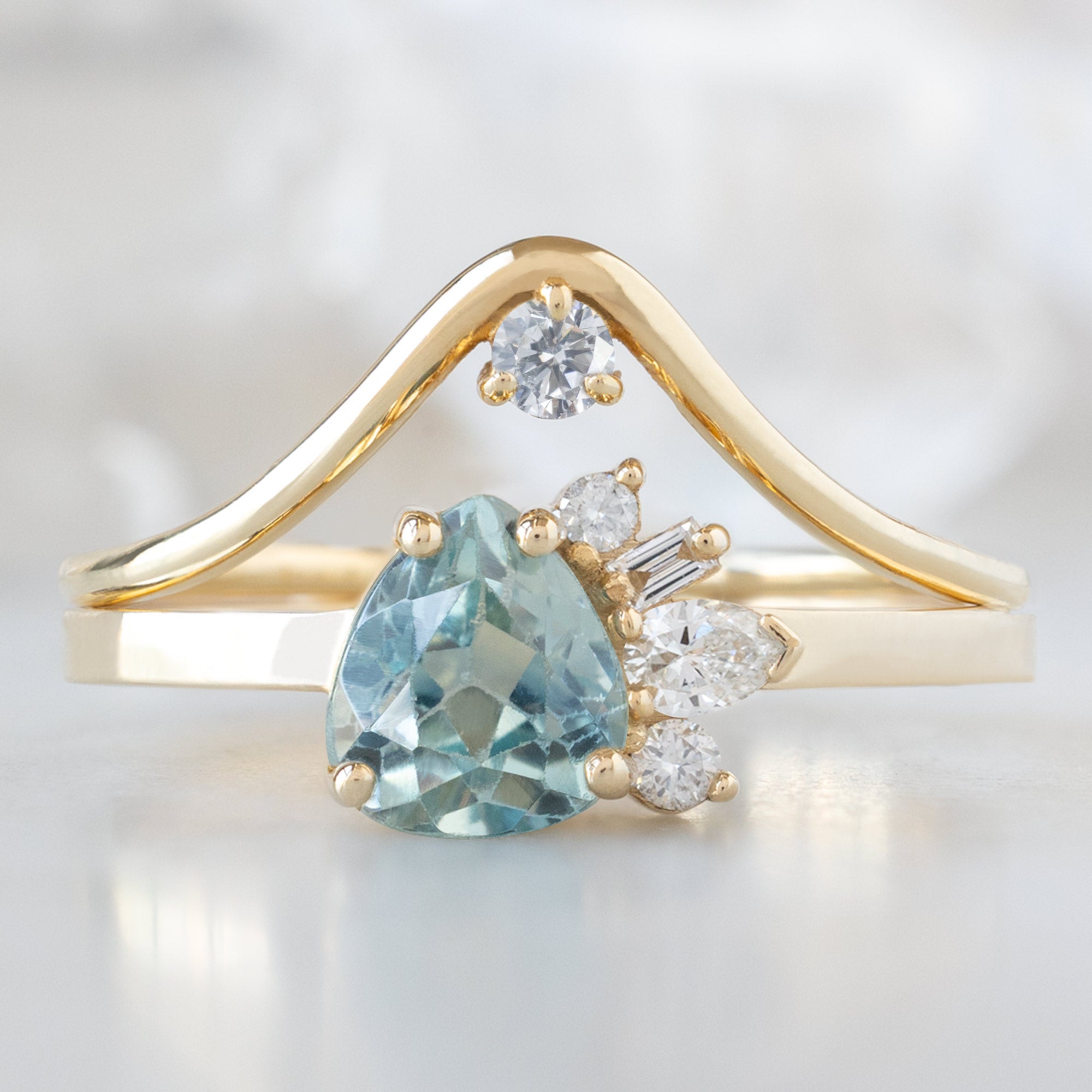 The Cluster Ring | 0.84ct Pear Cut Montana Sapphire in 14K Yellow Gold