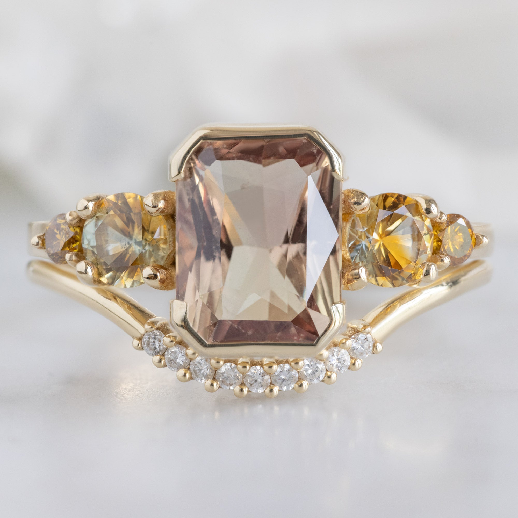 The Watercolor Ring | 2.04ct Emerald Cut Peach Sapphire in 14K Yellow Gold