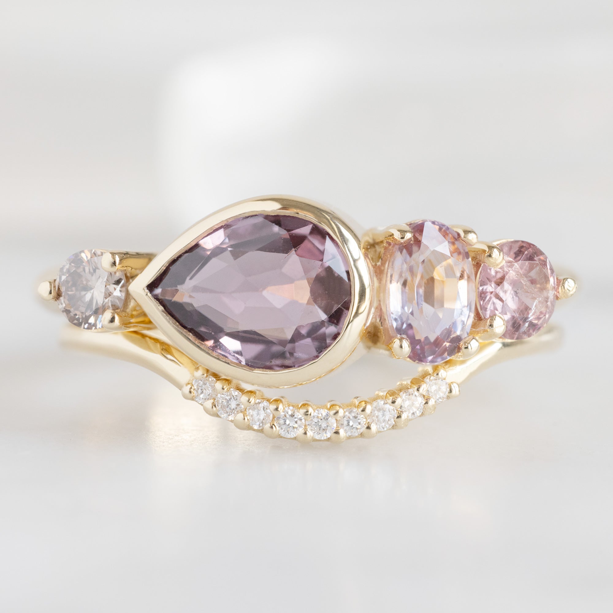 buy:the-watercolor-ring-1-27ct-pear-cut-colored-sapphire-in-14k-yellow-gold,white-diamond-pave-arc-stacking-band-14k-or-18k-yellow-gold