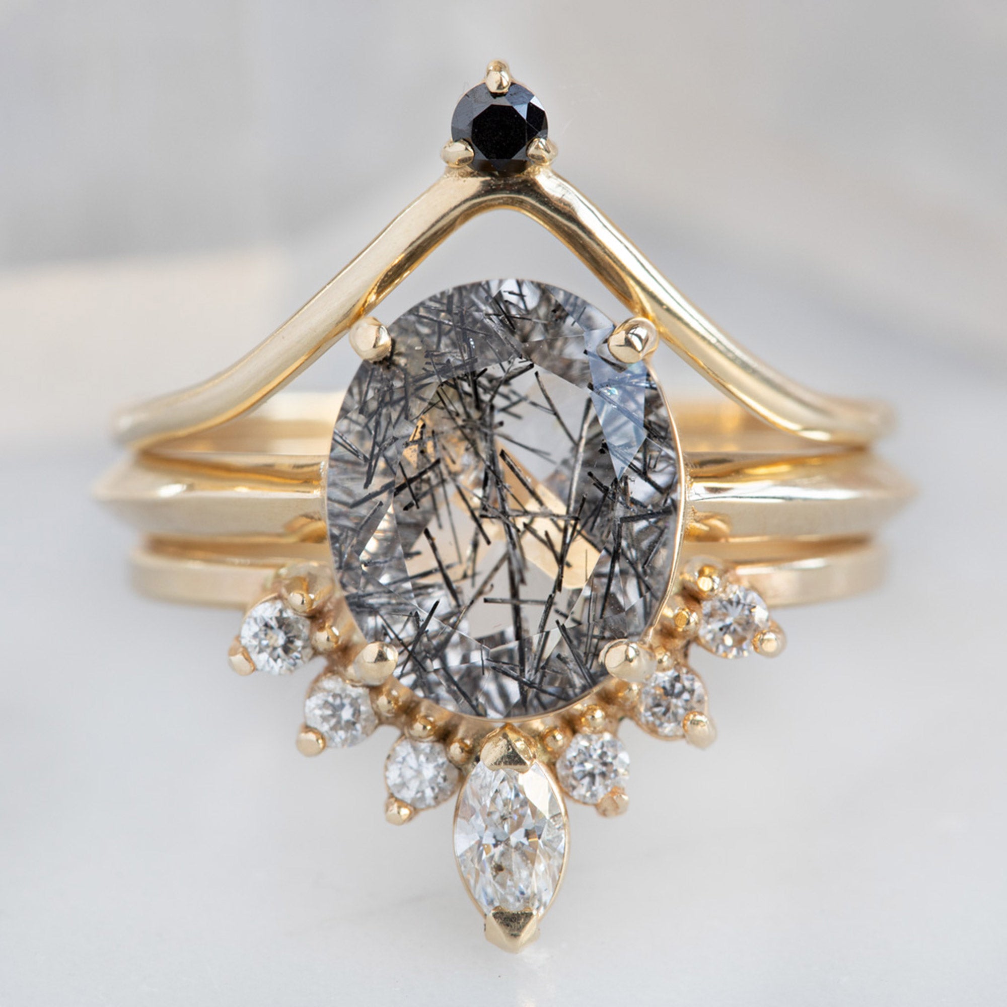 buy:black-diamond-crown-stacking-band-14k-or-18k-yellow-gold,the-bryn-ring-2-15ct-oval-tourmaline-in-quartz-in-14k-yellow-gold,marquise-white-diamond-sunburst-stacking-band-14k-gold
