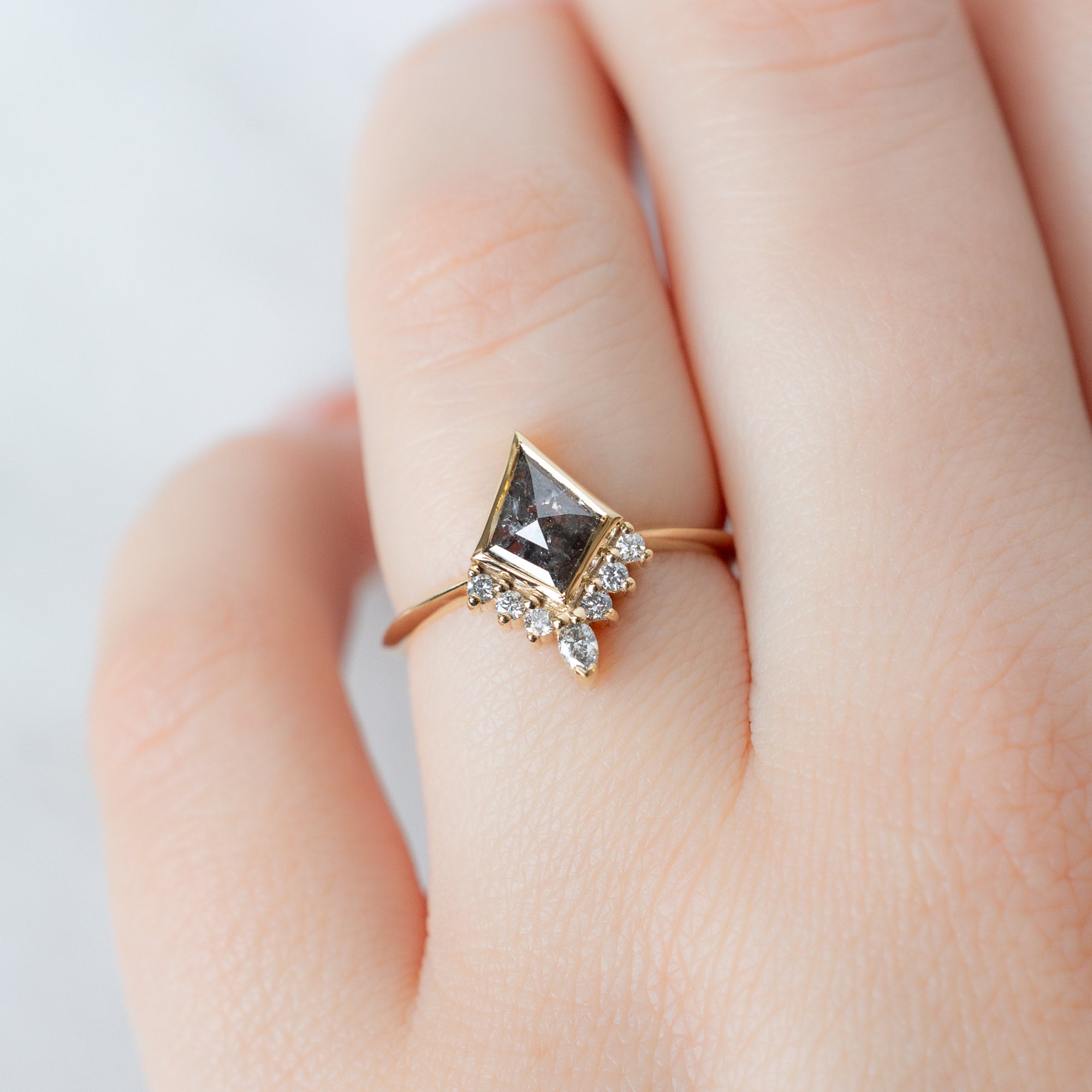 The Aster Ring with a 1.02ct Kite Salt and Pepper Diamond in 14K Yellow Gold on Model