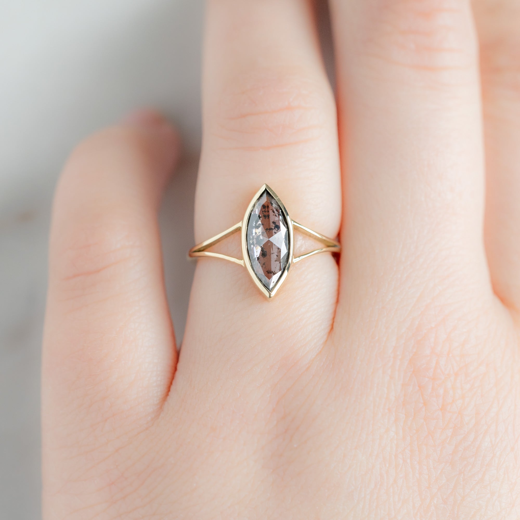 The Magnolia Ring with a 1.65ct Lab Grown Salt and Pepper Diamond in 14K Yellow Gold on Model
