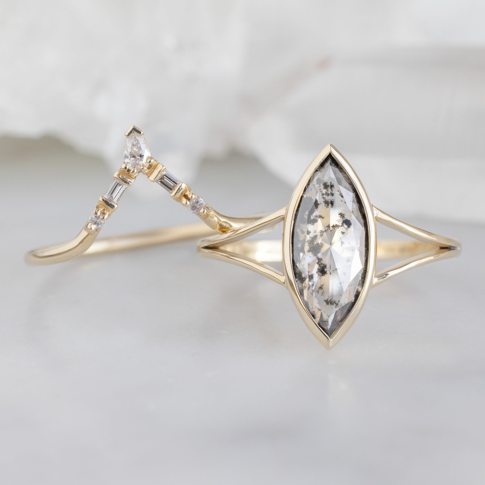 The Magnolia Ring with a 1.65ct Lab Grown Salt and Pepper Diamond in 14K Yellow Gold Stacked with the White Diamond Tiara Stacking Band