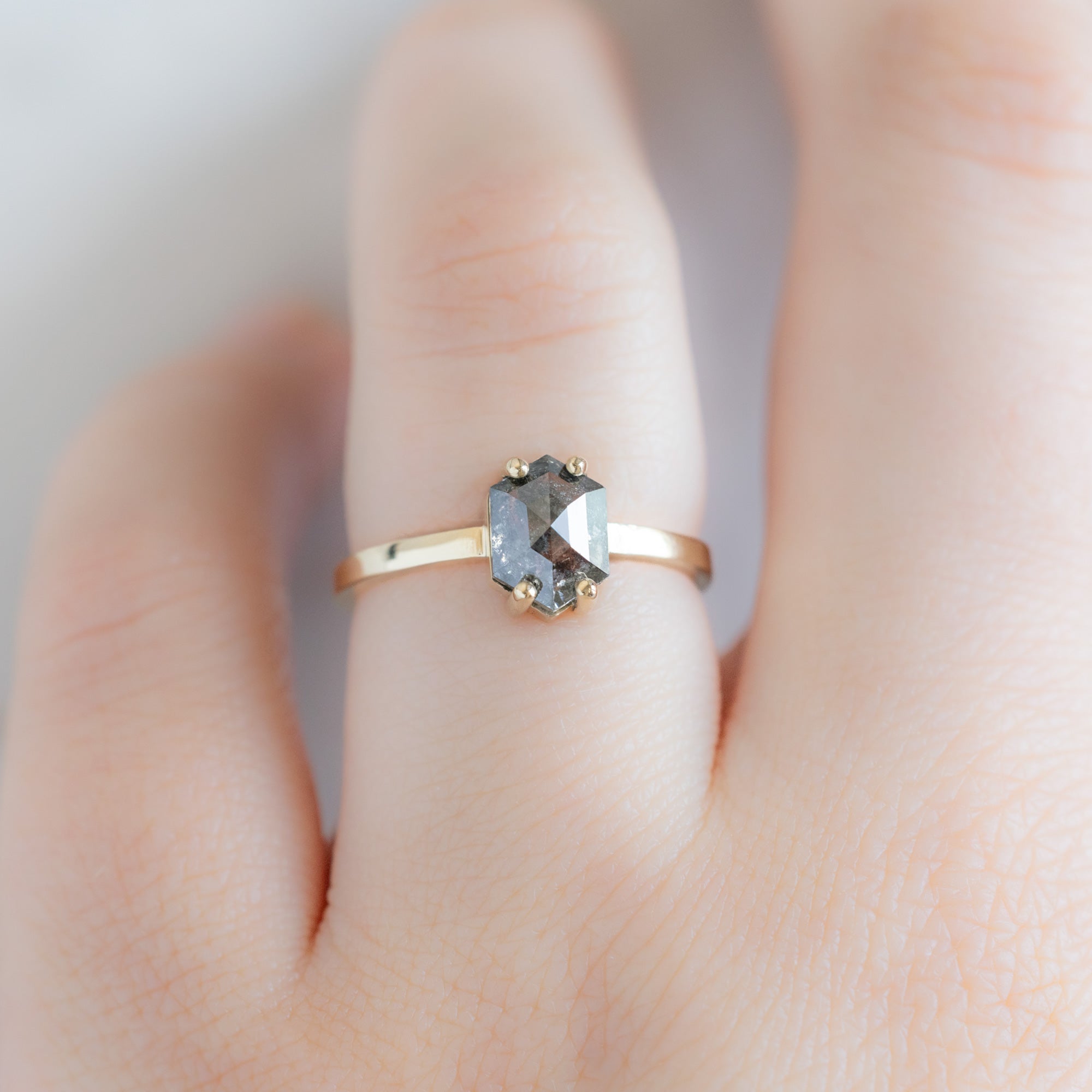 The Bryn Ring with a 1.42ct Hexagon Salt and Pepper Diamond in 14K Yellow Gold on Model