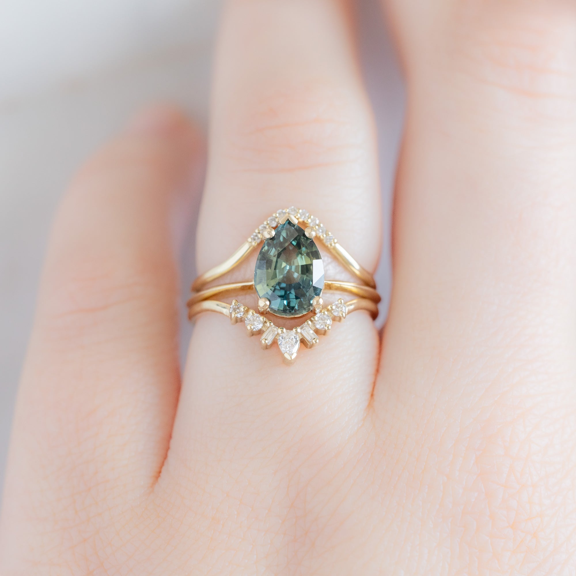 buy:white-diamond-pave-peak-stacking-band-14k-or-18k-yellow-gold,the-sage-ring-2-04ct-pear-teal-sapphire-in-14-yellow-gold,geometric-white-diamond-sunburst-stacking-band-14k-or-18k-yellow-gold