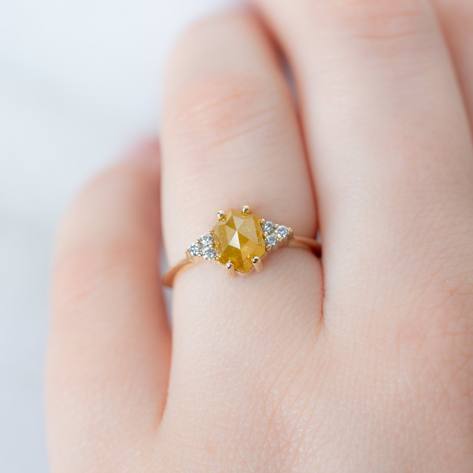 The Ivy Ring with a 1.48ct Hexagon Yellow Diamond in 14K Yellow Gold on Model