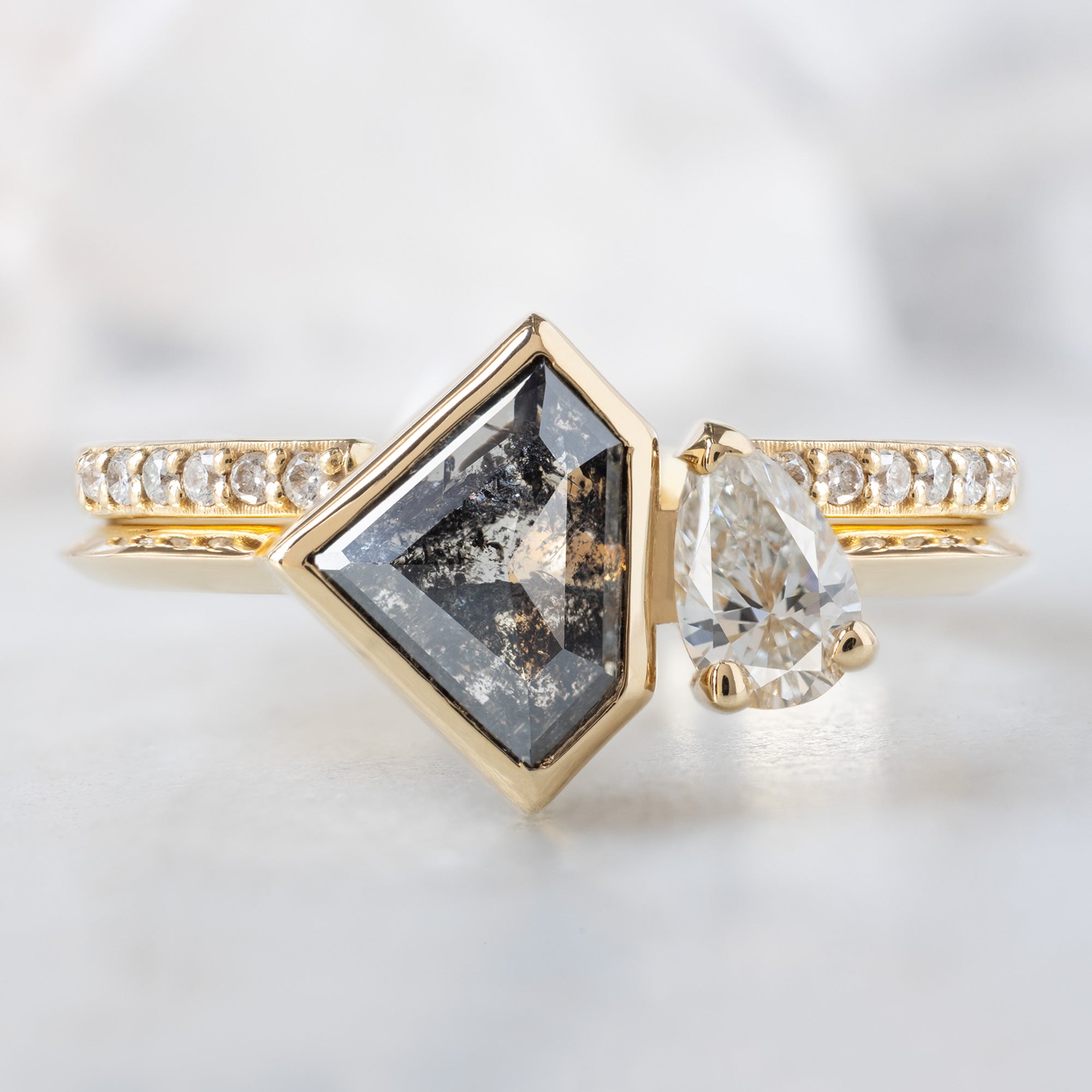 The You & Me Ring with a 1.18ct Shield Salt and Pepper Diamond in 14K Yellow Gold Stacked with the Open Cuff White Diamond Pavé Stacking Band