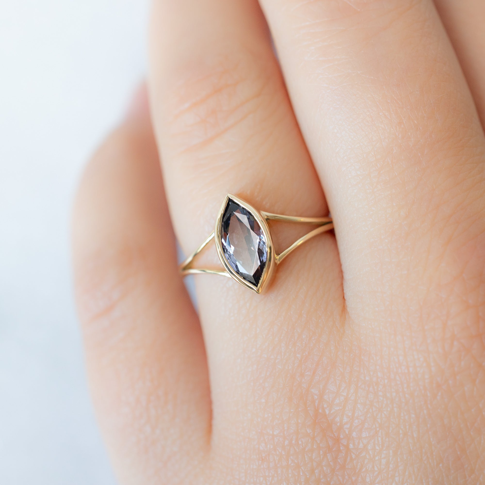 The Magnolia Ring with a 1.63ct Marquise Tanzanite in 14K Yellow Gold on Model