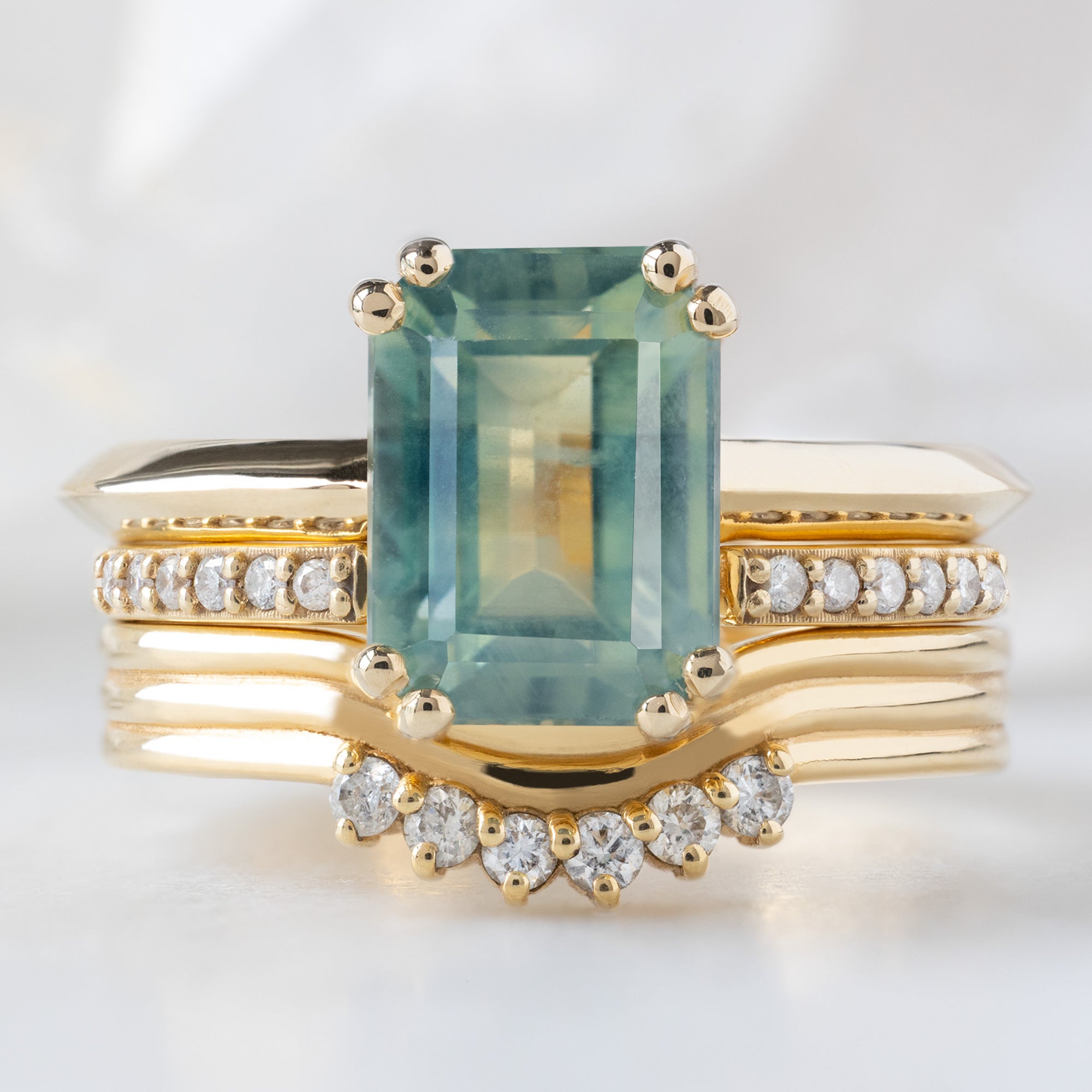 buy:the-bryn-ring-2-97ct-emerald-cut-bi-color-sapphire-in-14k-yellow-gold,open-cuff-white-diamond-pave-stacking-band-14k-or-18k-yellow-gold,the-arc-stratum-stacking-band-with-lab-grown-diamonds-18k-yellow-gold