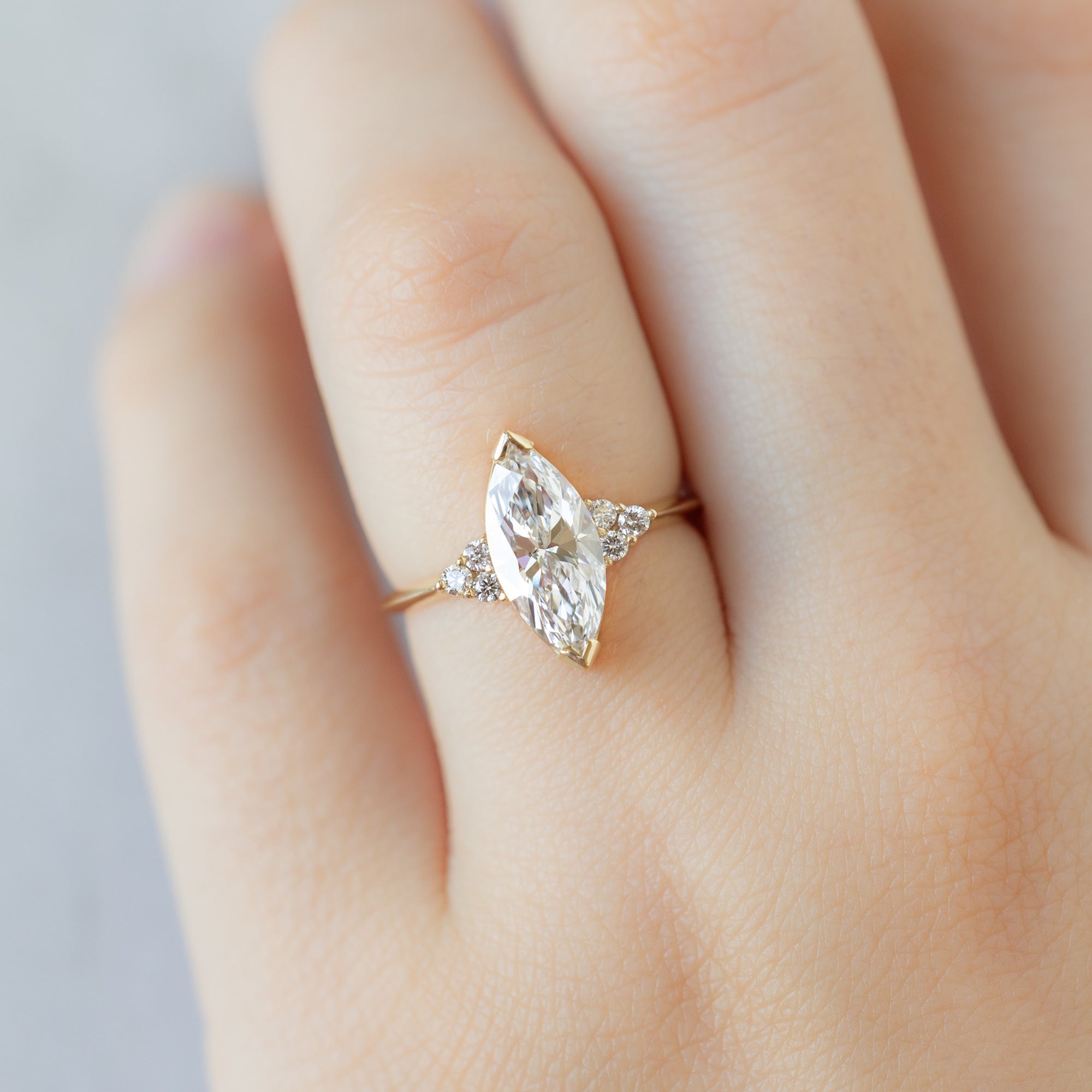 The Ivy Ring with a 1.64ct Marquise Lab Grown White Diamond in 14K Yellow Gold on Model