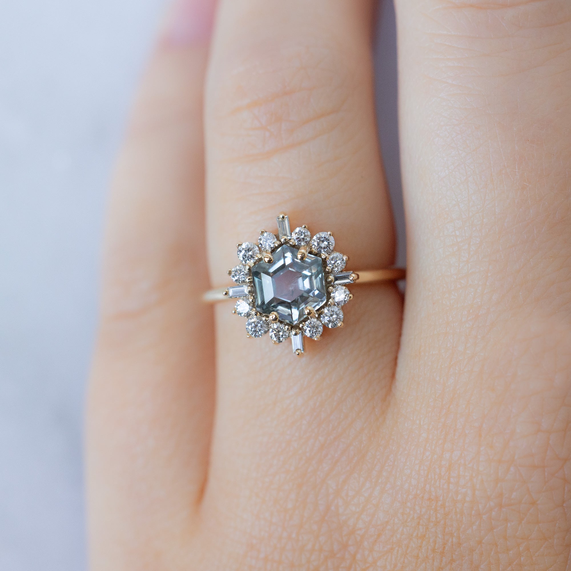 The Compass Ring with a 1.67ct Hexagon Grey Sapphire in 14K Yellow Gold on Model