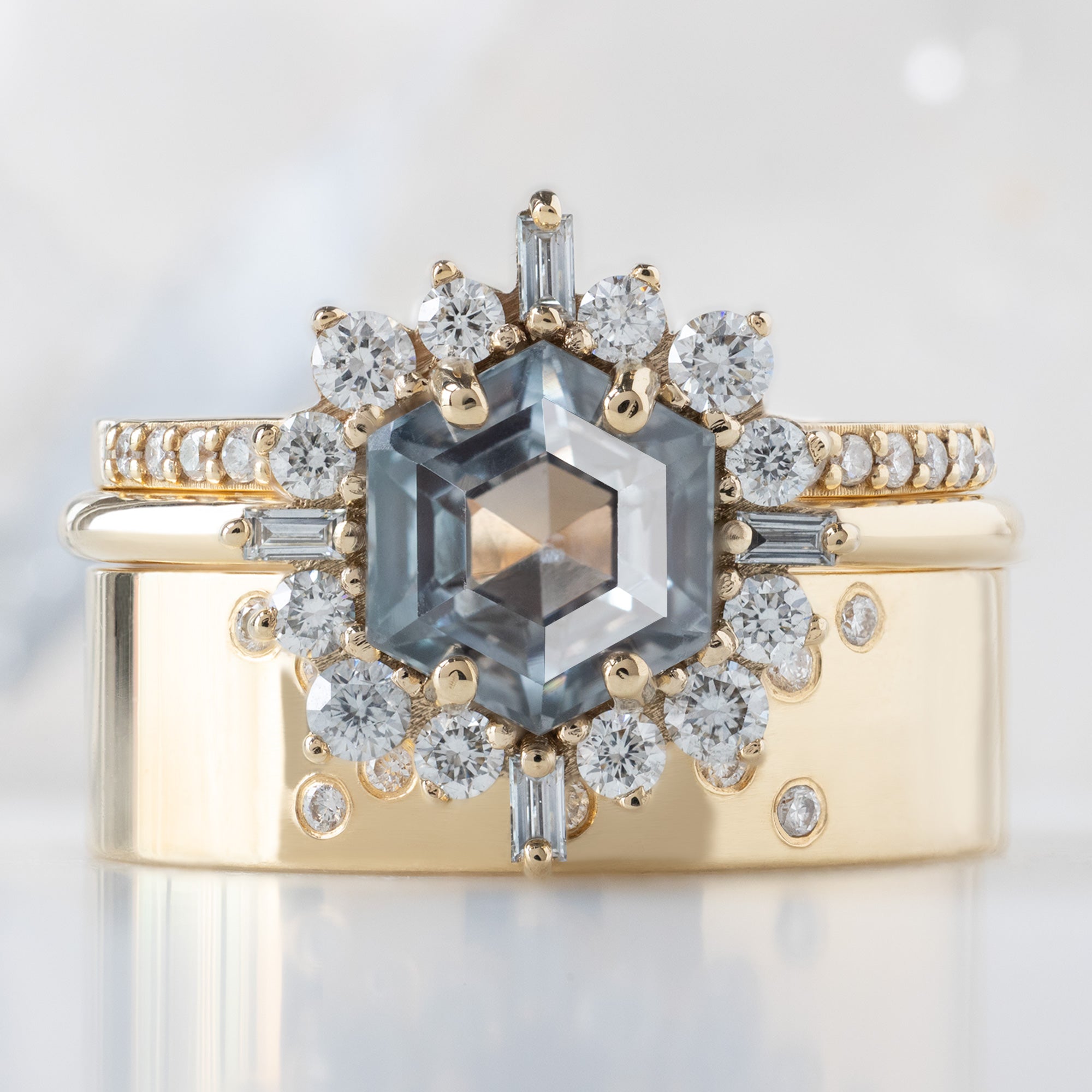 buy:the-white-diamond-pave-wedding-band-14k-or-18k-yellow-gold,the-compass-ring-1-67ct-hexagon-grey-sapphire-in-14k-yellow-gold,constellation-cut-out-stacking-band-arc-cut-out-in-14k-yellow-gold