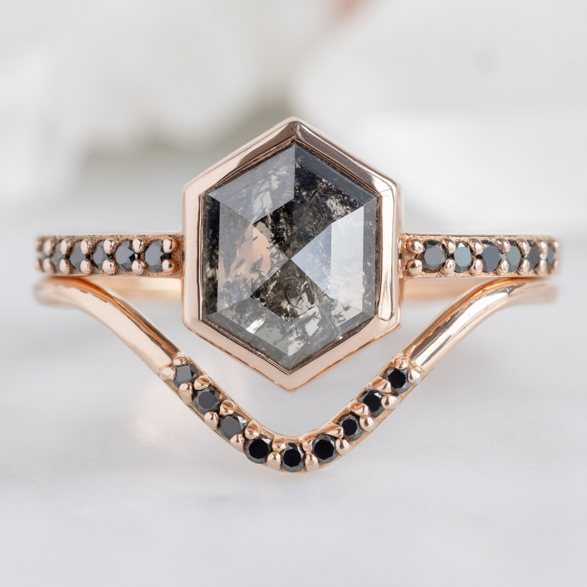 The Willow Ring with a 1.19ct Hexagon Black Diamond in 14K Rose Gold Stacked with the Black Pavé Diamond Stacking Band