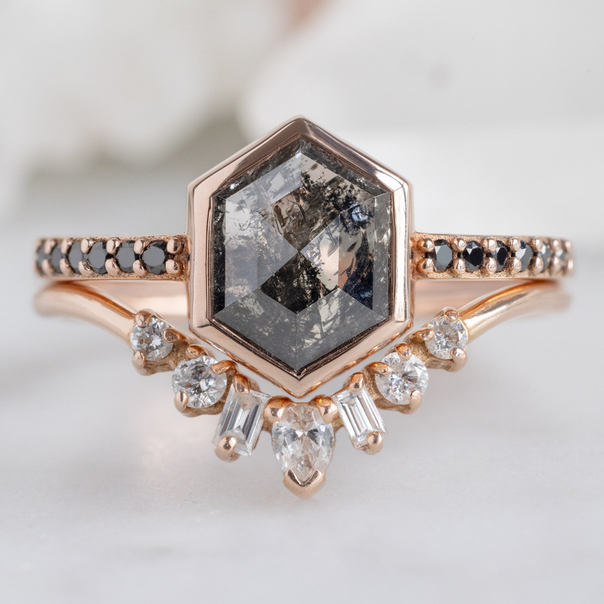 The Willow Ring with a 1.19ct Hexagon Black Diamond in 14K Rose GoldStacked with the Geometric White Diamond Sunburst Stacking Band