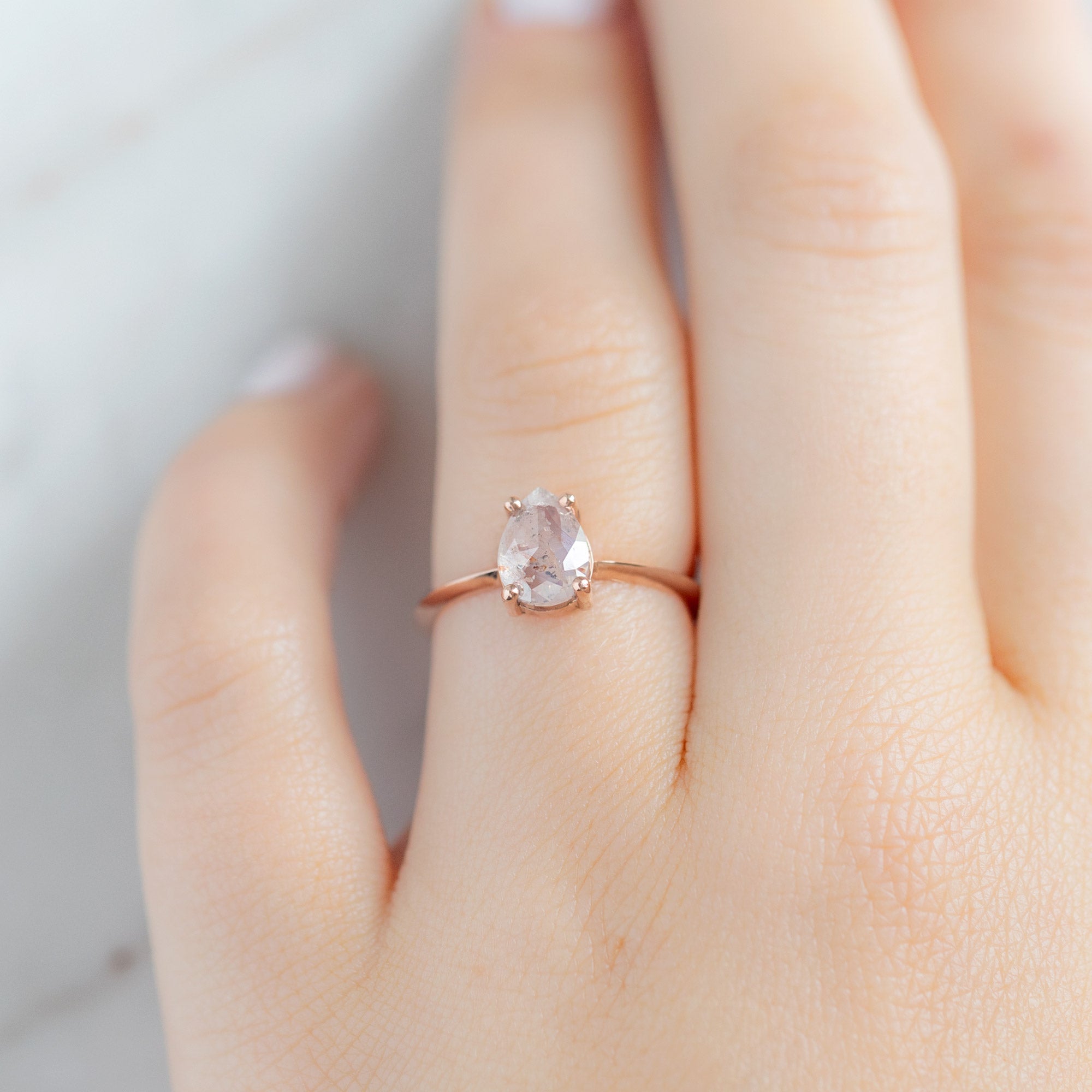 The Bryn Ring with a 1.47ct Pear Pink Diamond in 14K Rose Gold on Model