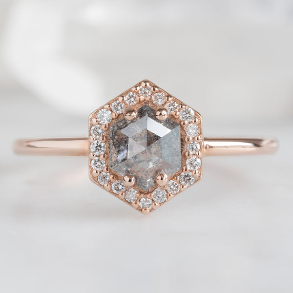 The Dahlia Ring with a .60ct Hexagon Salt and Pepper Diamond in 14K Rose Gold on a white background