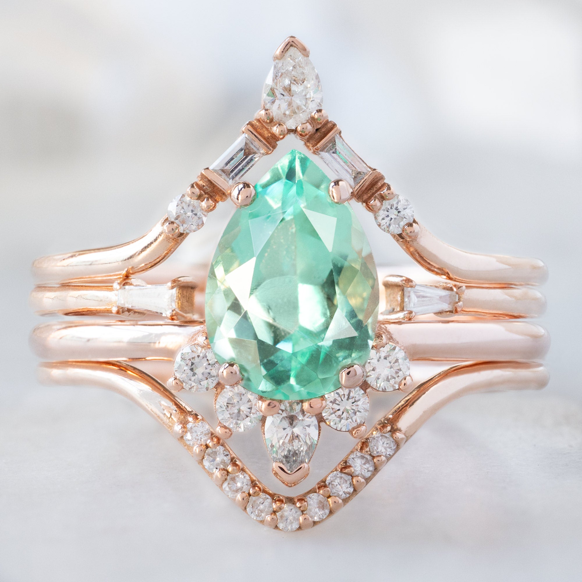 buy:white-diamond-tiara-stacking-band-14k-or-18k-yellow-gold,open-cuff-baguette-white-diamond-stacking-band-14k-or-18k-yellow-gold,the-aster-ring-1-15ct-pear-cut-emerald-in-14k-rose-gold,white-diamond-pave-peak-stacking-band-14k-or-18k-yellow-gold