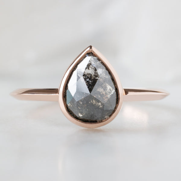 The Hazel Ring with a 1.68ct Rose Cut Black Diamond in 14K Rose Gold on White Marble