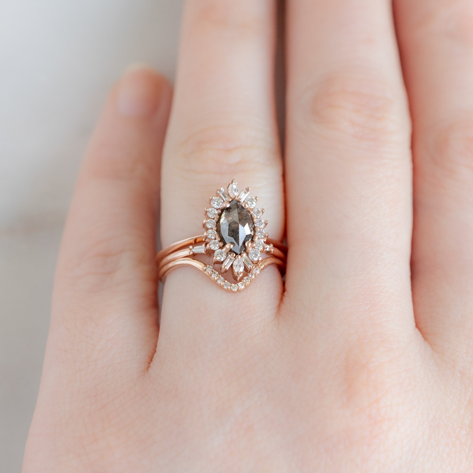 buy:the-camellia-ring-0-94ct-marquise-cut-black-diamond-in-14k-rose-gold,open-cuff-baguette-white-diamond-stacking-band-14k-or-18k-rose-gold,white-diamond-pave-peak-stacking-band-14k-or-18k-rose-gold