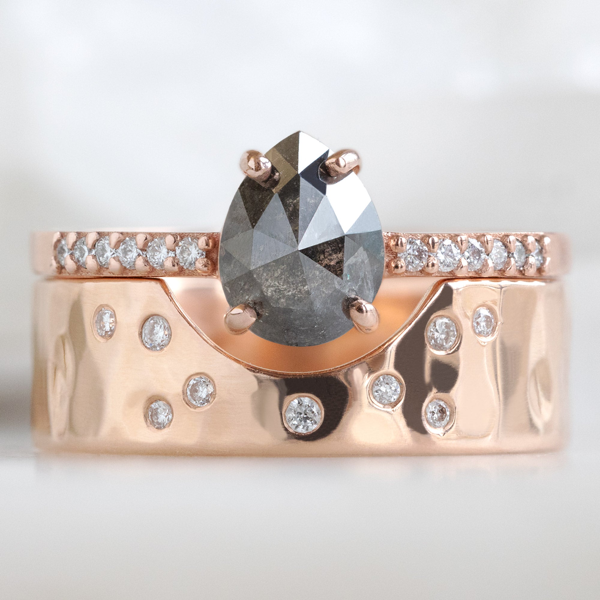 buy:the-willow-ring-0-81ct-pear-black-diamond-in-14k-rose-gold,constellation-cut-out-stacking-band-arc-cut-out-in-14k-yellow-gold