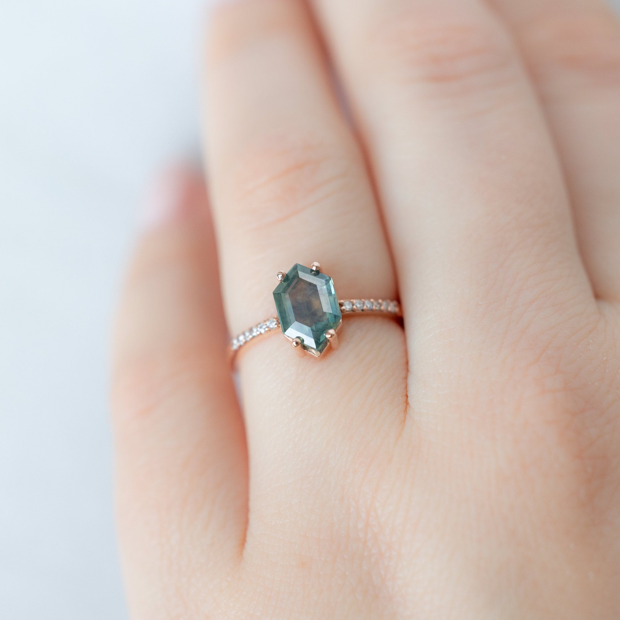 The Willow Ring with a 1.86ct Hexagon Montana Sapphire in 14K Rose Gold on Model