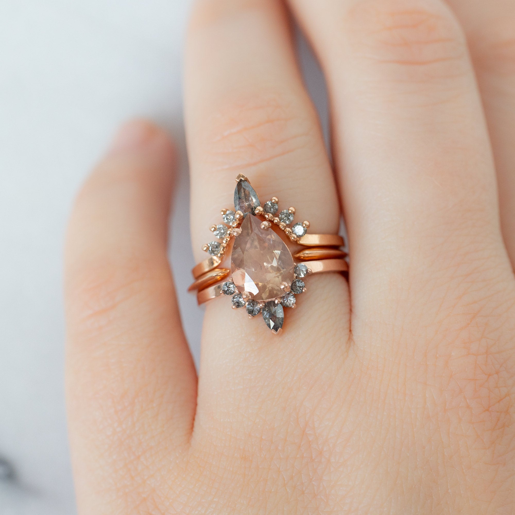 buy:salt-and-pepper-pear-diamond-sunburst-stacking-band-14k-gold,gold-open-cuff-knife-edge-stacking-band-14k-yellow-gold,the-aster-ring-1-49ct-pear-sunstone-in-14k-rose-gold