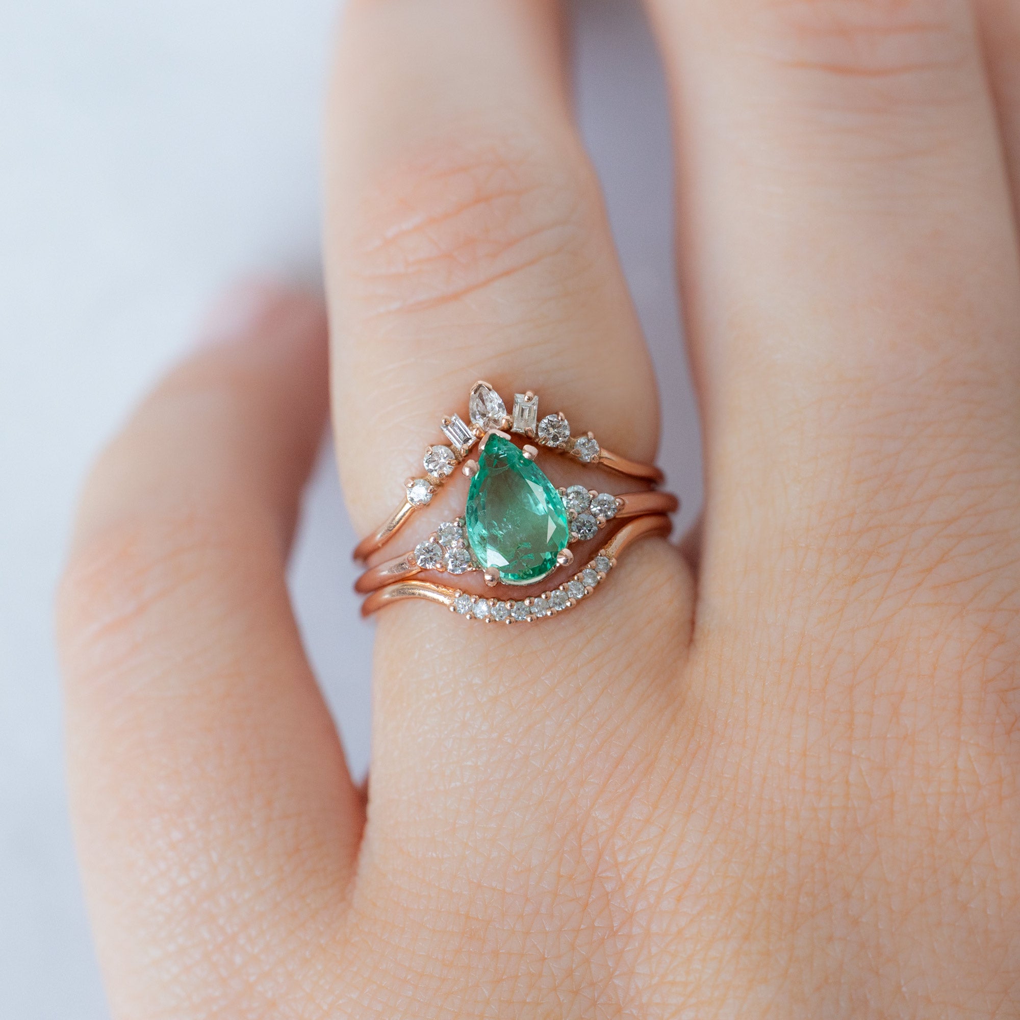 buy:geometric-white-diamond-sunburst-stacking-band-14k-or-18k-yellow-gold,the-ivy-ring-1-23ct-pear-emerald-in-14k-yellow-gold,white-diamond-pave-arc-stacking-band-14k-or-18k-yellow-gold