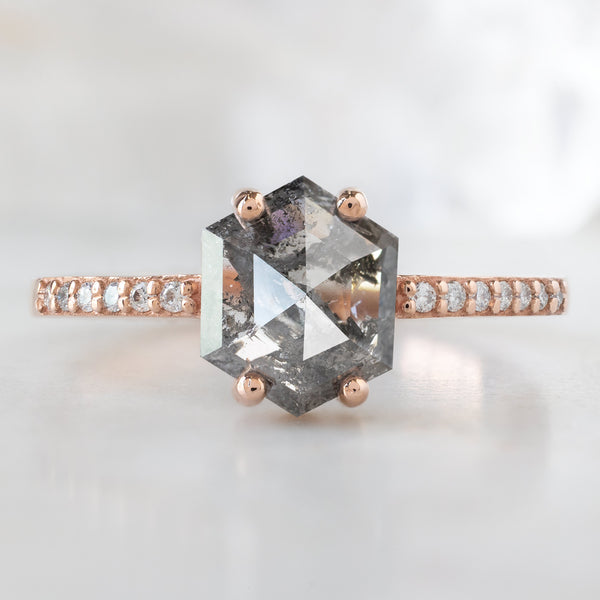 The Willow Ring with a 1.35ct Hexagon Salt and Pepper Diamond in 14K Rose Gold on White Marble