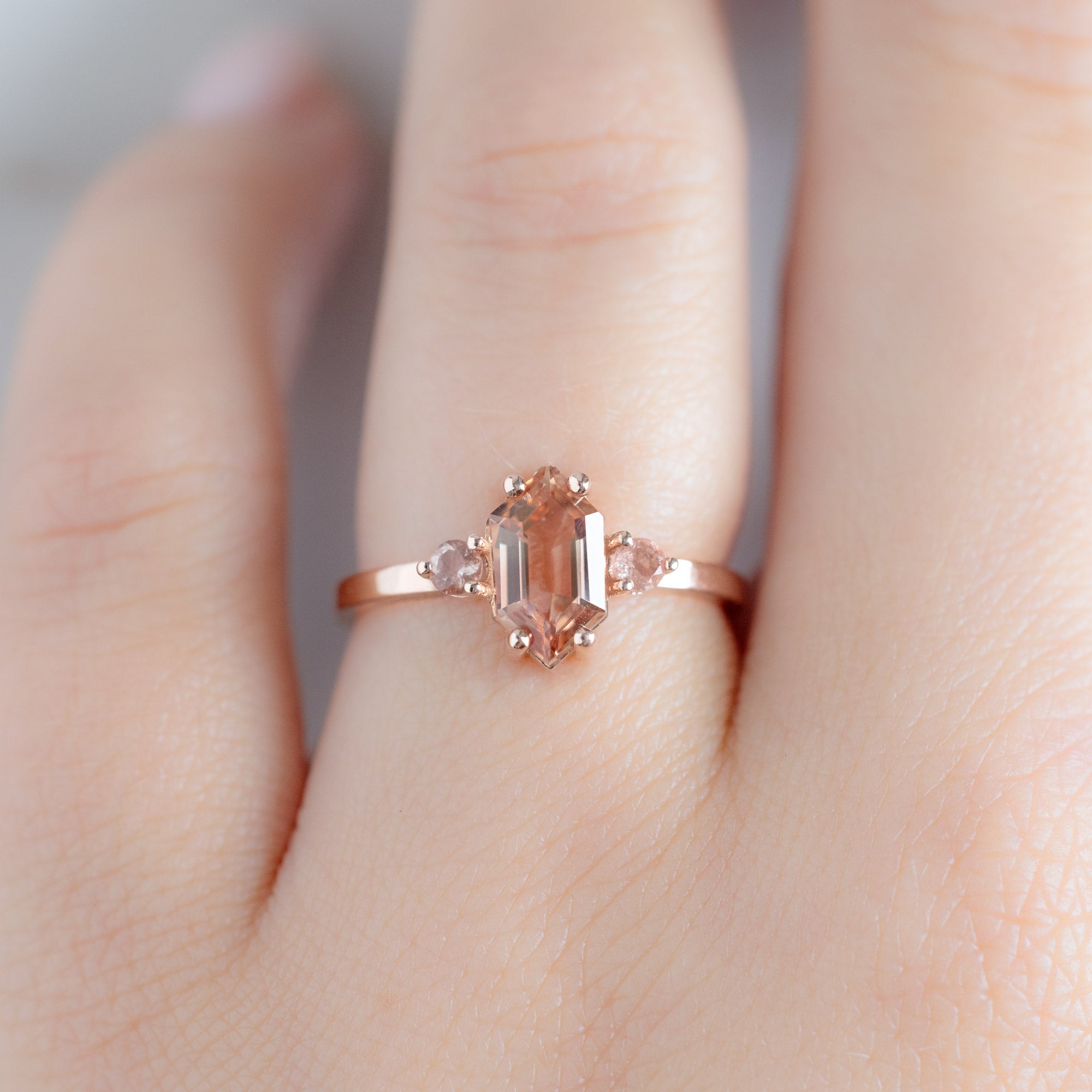 The Monochrome Ring with a 1.0ct Hexagon Sunstone in 14k Rose Gold on Model