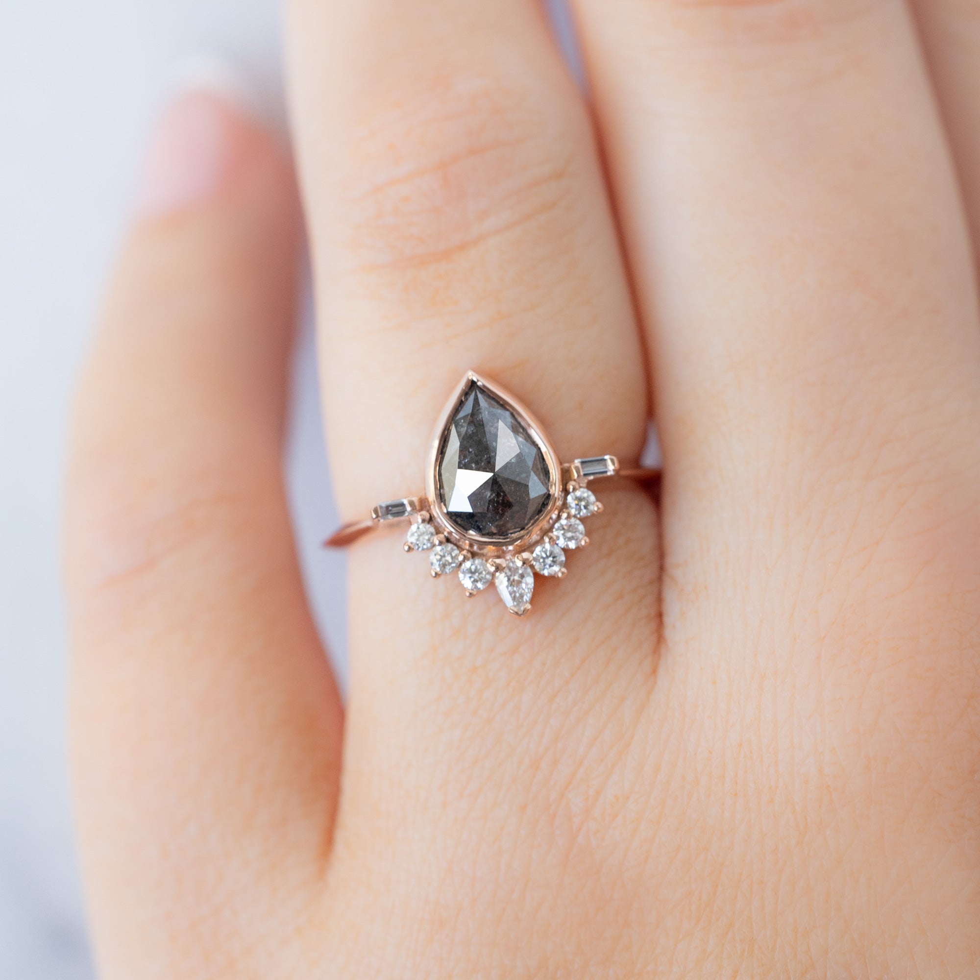 The Posy Ring with a 1.32ct Pear Black Diamond in 14K Rose Gold on Model
