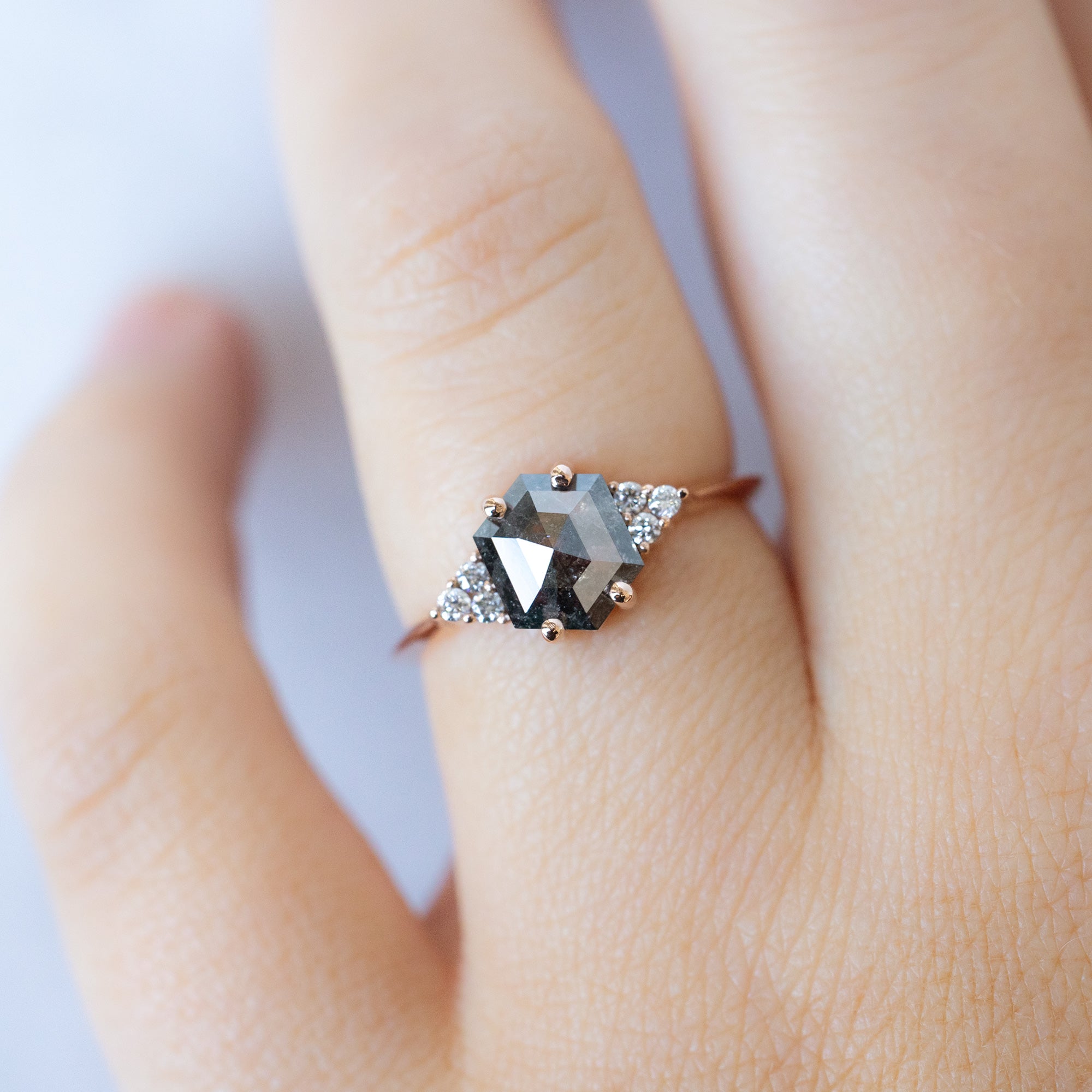 The Ivy Ring with a 1.53ct Hexagon Salt and Pepper Diamond in 14K Rose Gold on Model