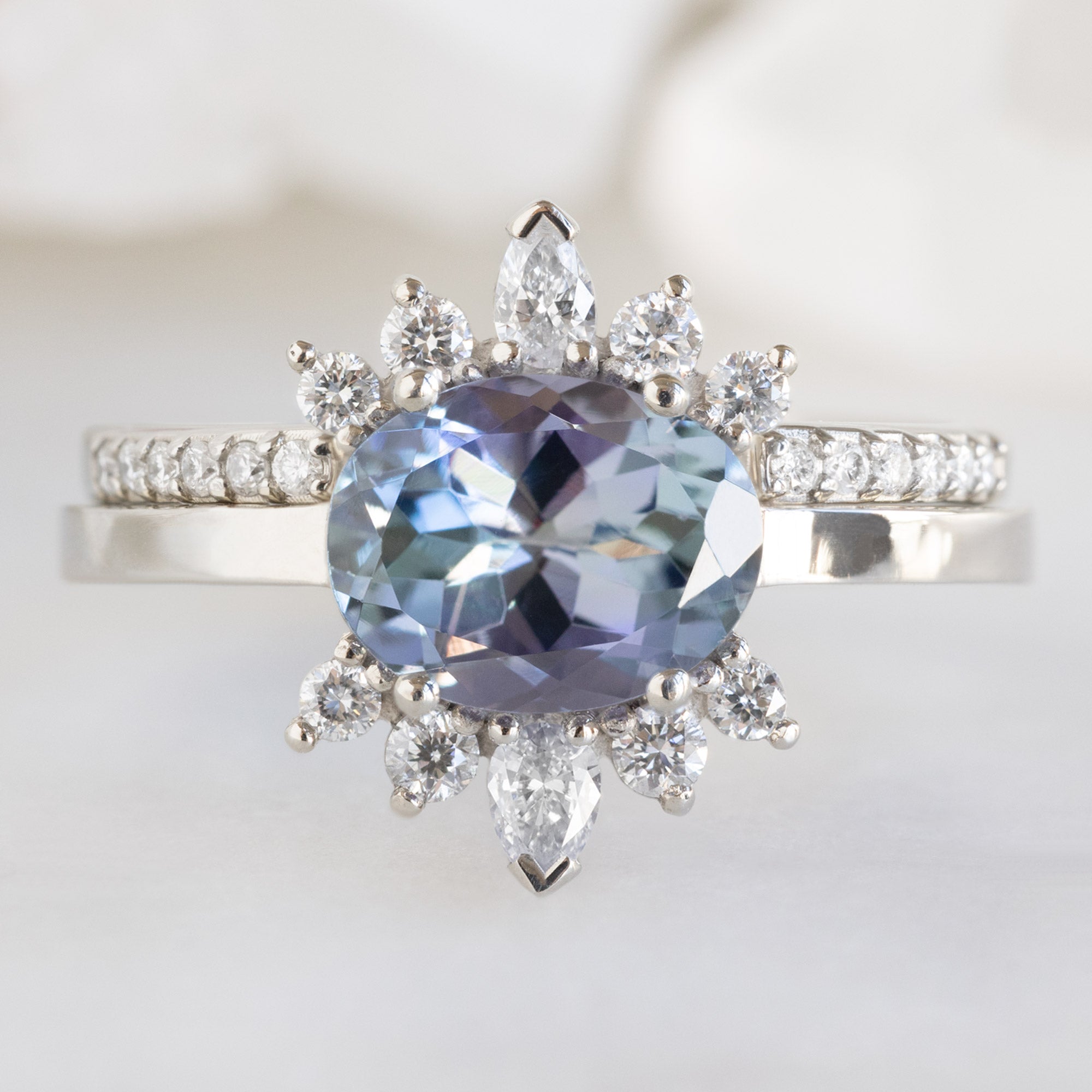 buy:the-lotus-ring-1-45ct-oval-tanzanite-in-14k-white-gold,open-cuff-white-diamond-pave-stacking-band-14k-or-18k-yellow-gold