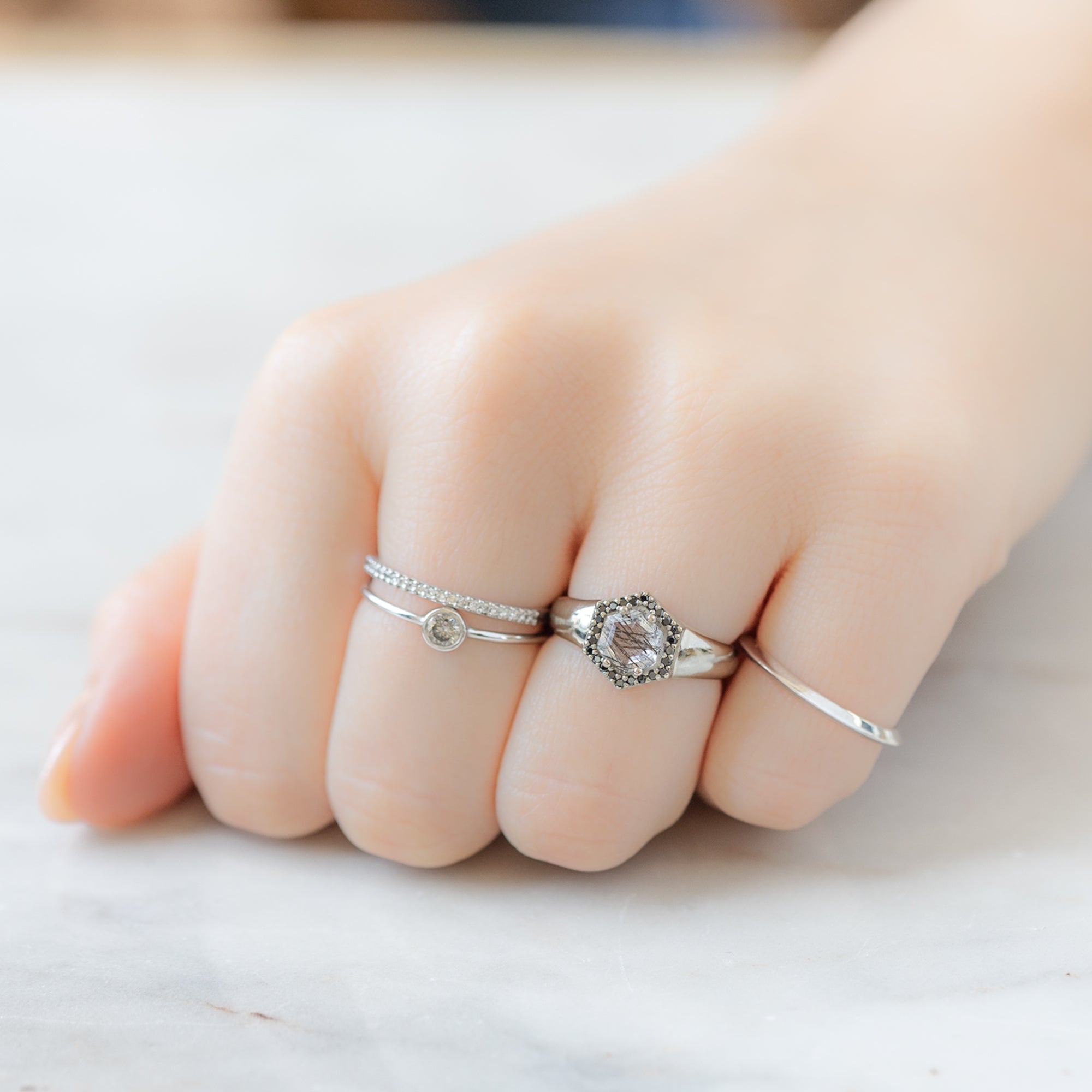 buy:the-white-diamond-pave-wedding-band-14k-or-18k-white-gold,the-round-salt-and-pepper-diamond-stacking-ring-14k-white-gold,the-signet-ring-0-70ct-hexagon-tourmaline-in-quartz-in-14k-white-gold,the-unisex-gold-knife-edge-band-14k-white-gold