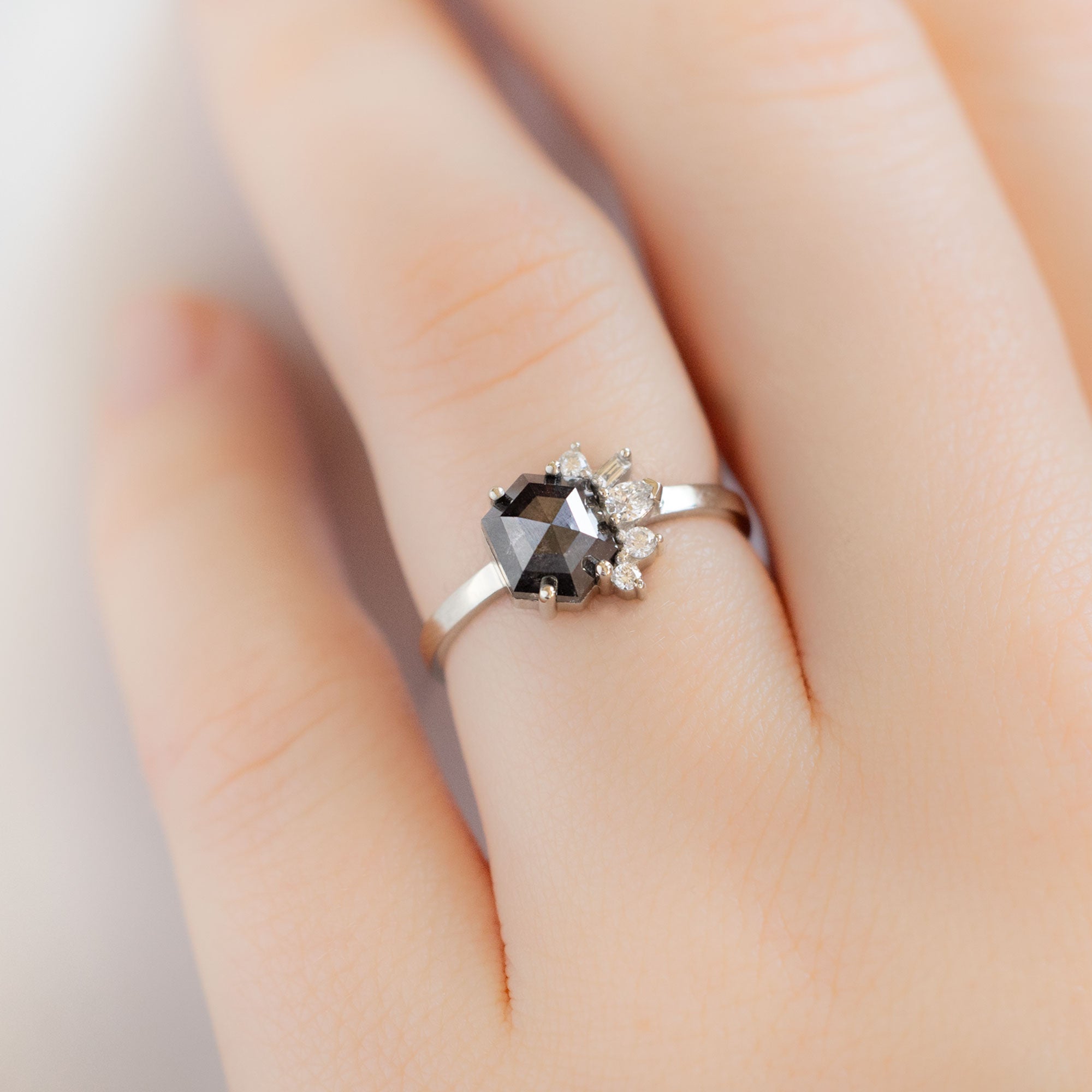 The Cluster Ring with a 1.25ct Hexagon Black Diamond in 14K White Gold on Model