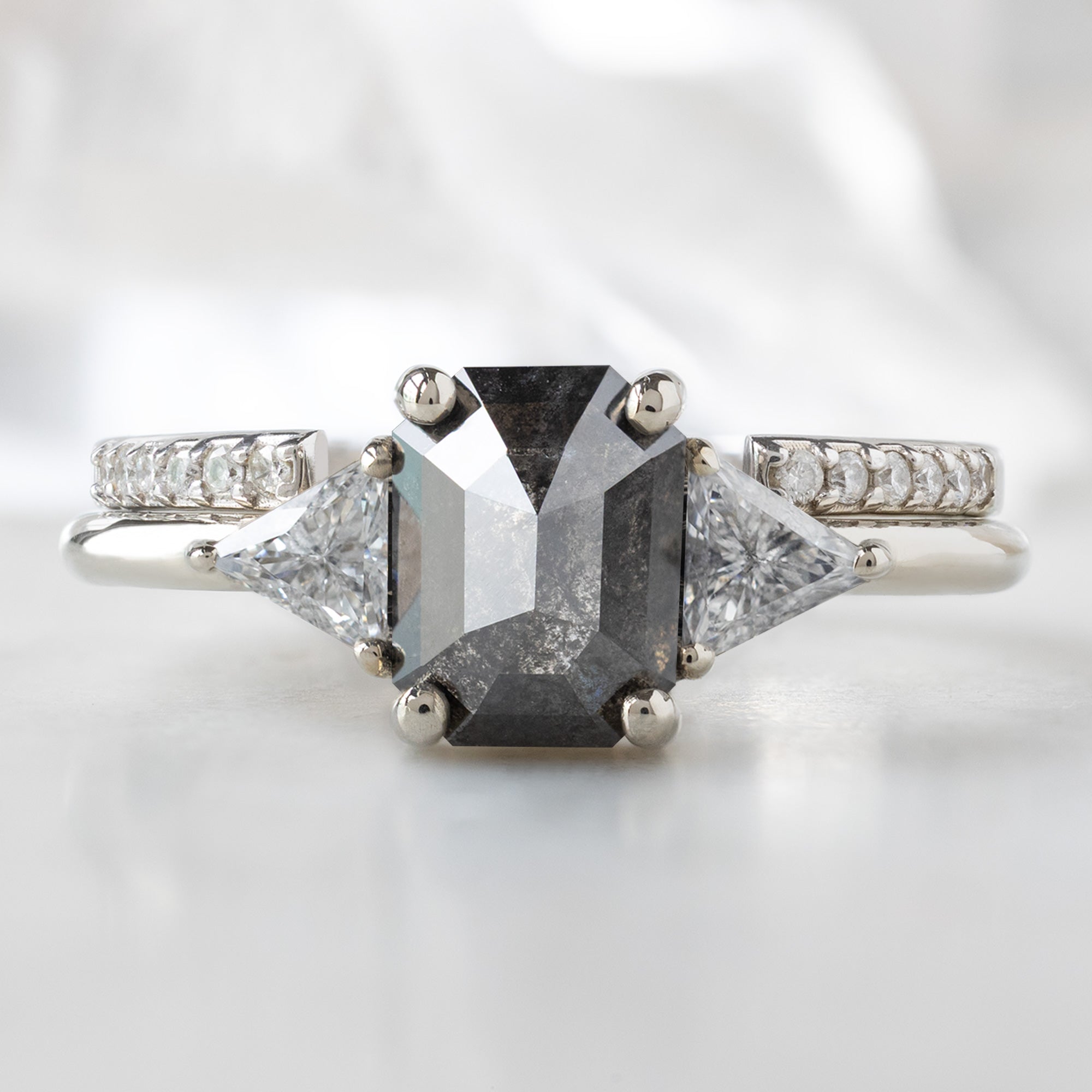 The Jade Ring with a 1.26ct Emerald Cut Black Diamond in 14K White Gold Stacked with the Open Cuff White Diamond Pavé Stacking Band