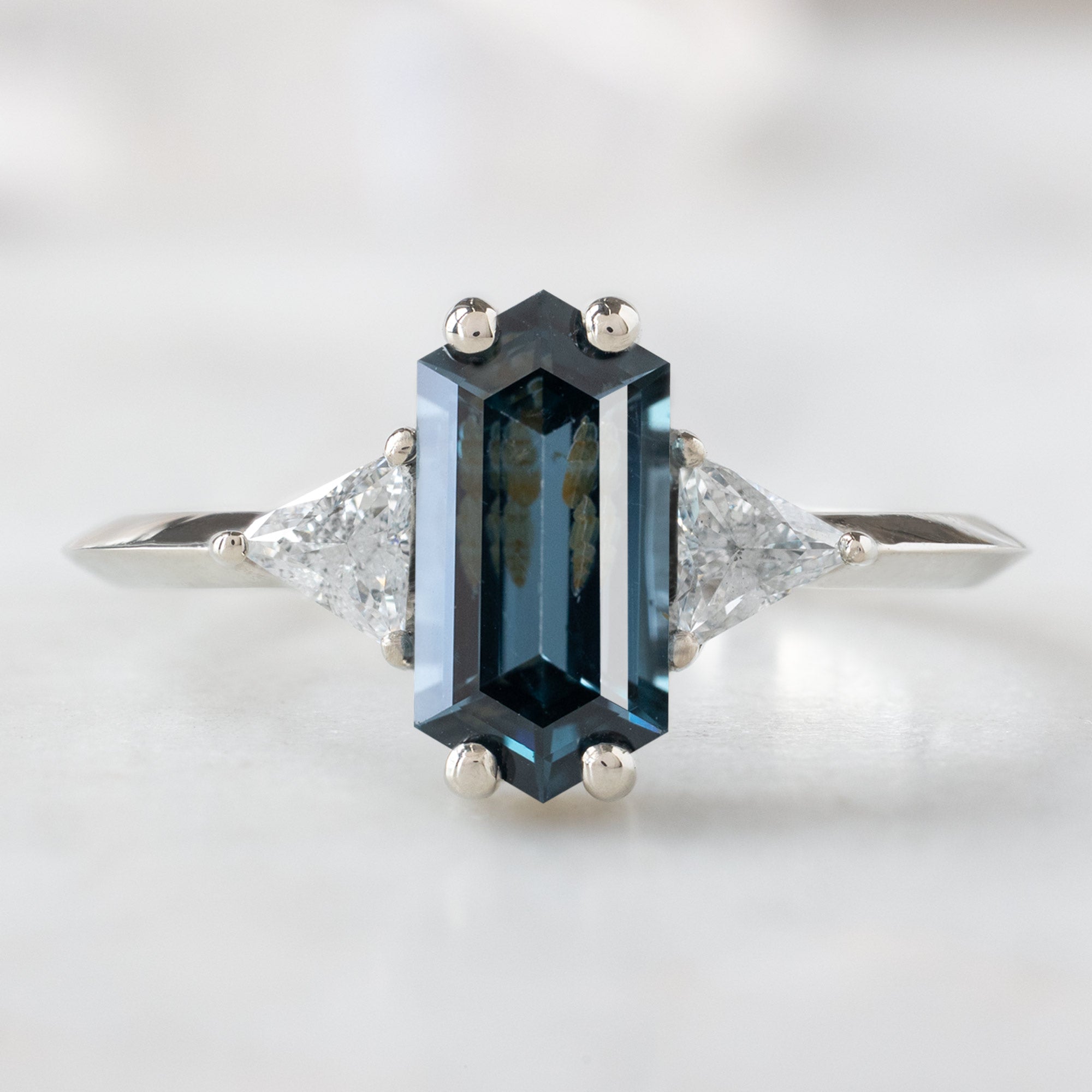 The Jade Ring with a 1.11ct Hexagonal Blue Spinel in 14K White Gold on white background