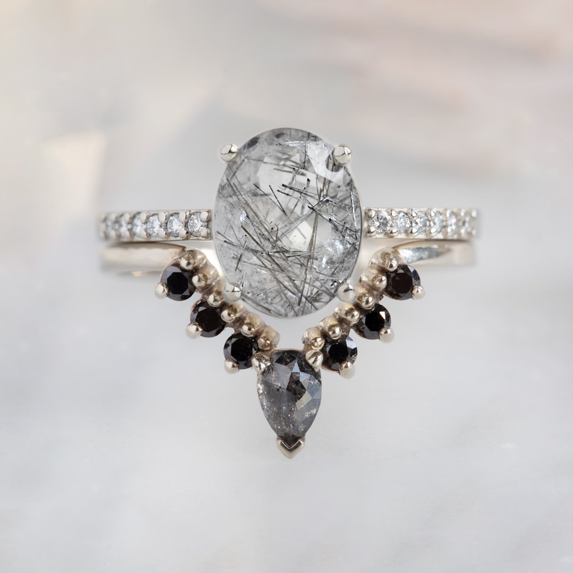 The Willow Ring with a 1.82ct Oval Tourmaline in Quartz in 14K White Gold with Black Diamond Sunburst Stacking Band